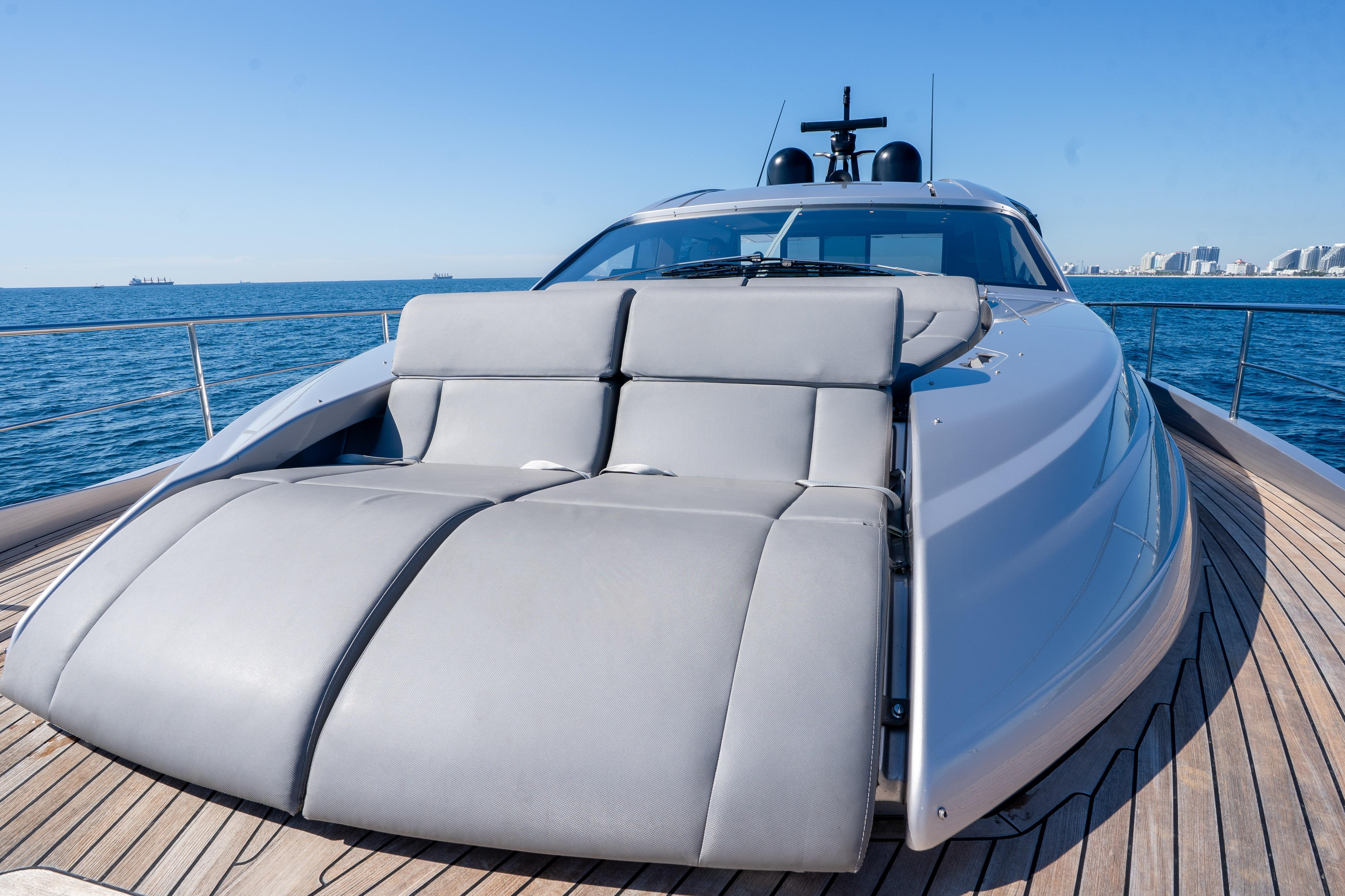 Luxurious 2024 Pershing 7X yacht with sleek design and spacious deck, cruising on open sea.