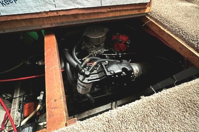 Engine compartment of a 1989 Carver 32 Aft Cabin Motor Yacht.