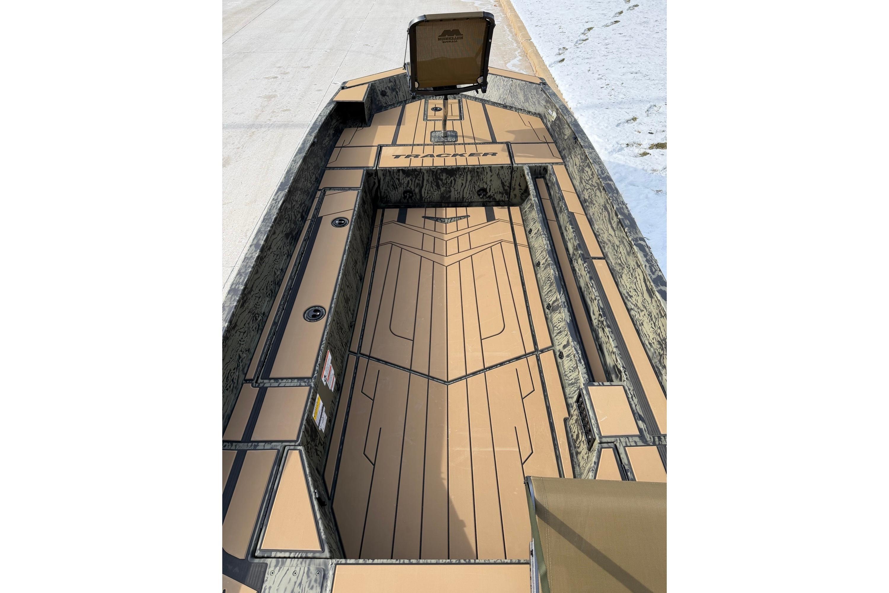2026 Tracker Grizzly 1756 T Marsh boat interior with tan and black design.