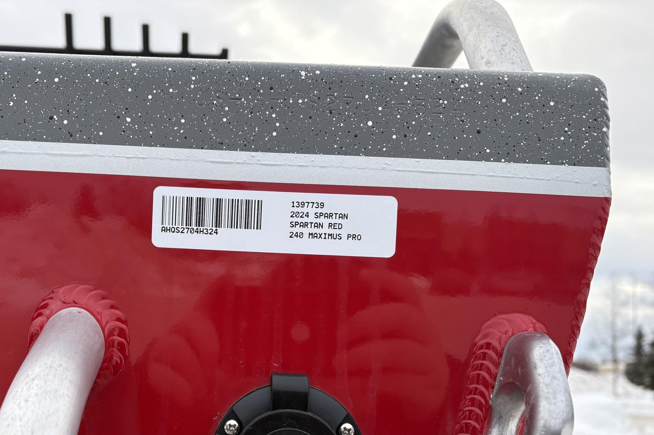 2024 Spartan 240 Maximus Pro label on red equipment with barcode.