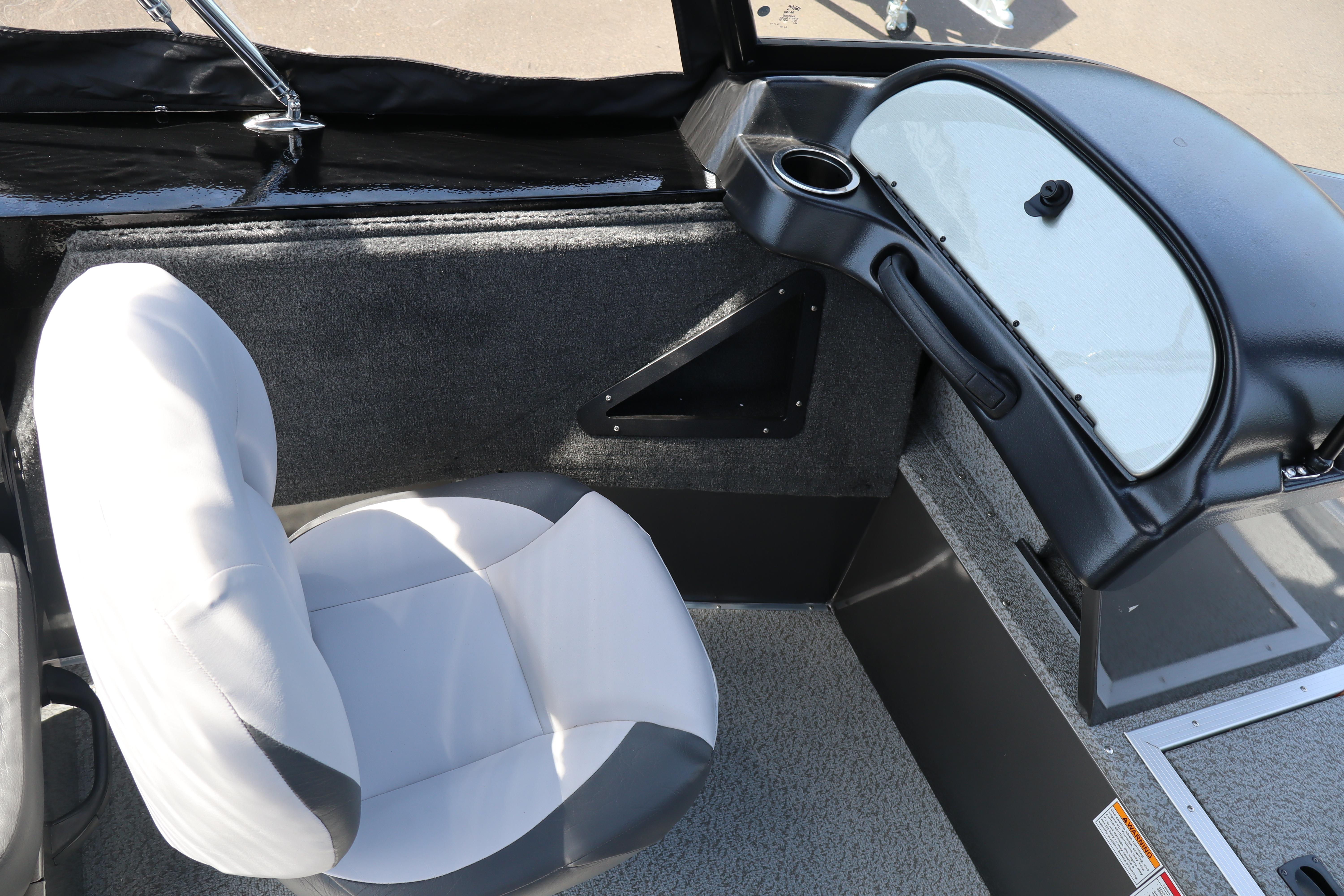 2026 Smoker Craft Osprey 172 boat interior with seating and dashboard view.