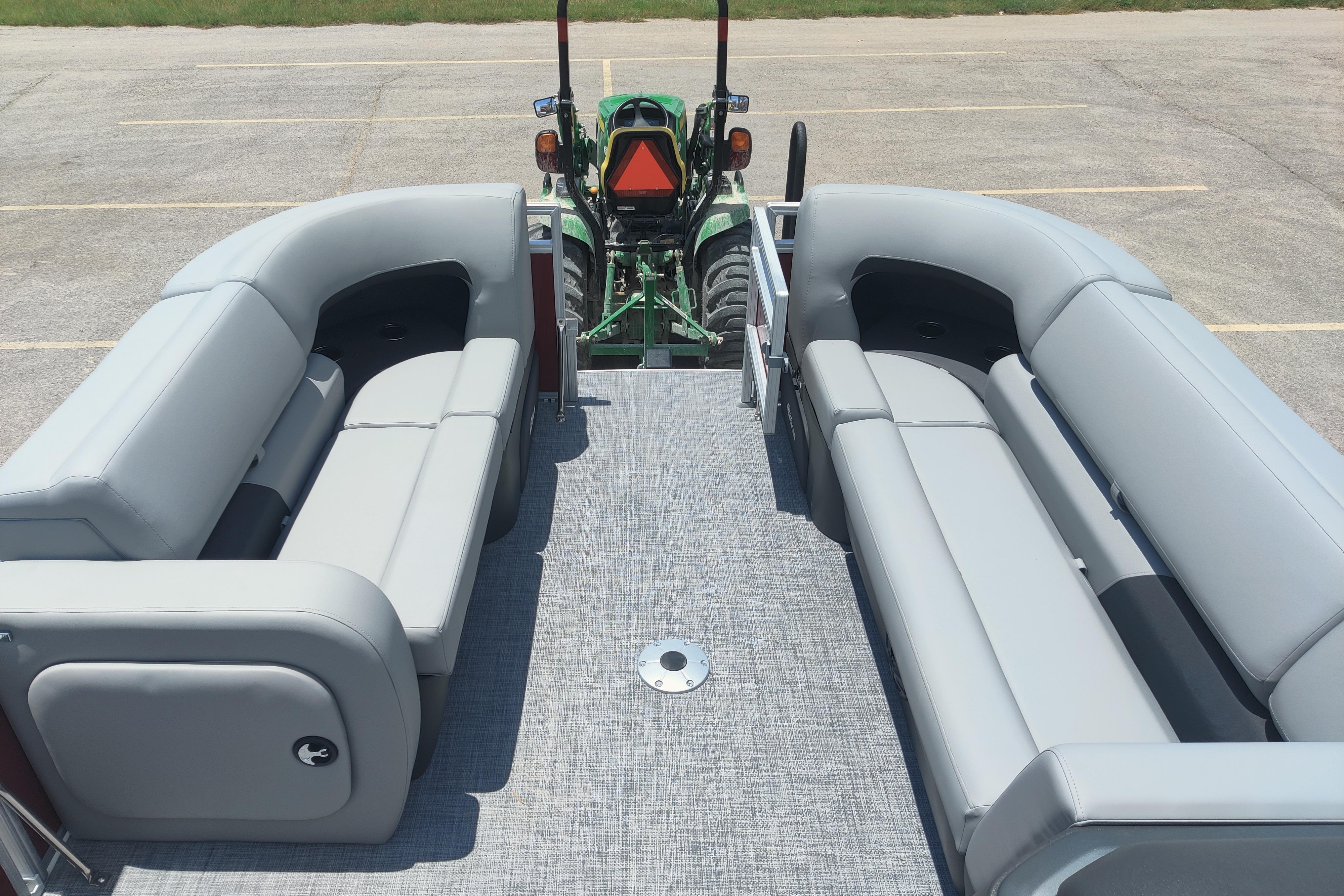 2026 Sun Tracker SportFish 22 DLX pontoon boat interior with spacious seating and modern design.