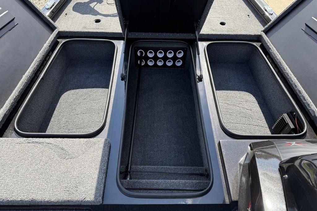2023 Vexus AVX189 boat storage compartments with open lids, showcasing ample space.