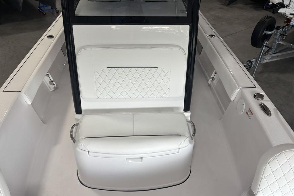 2026 Sportsman Masters 247 Bay Boat interior with white seating and diamond stitching.