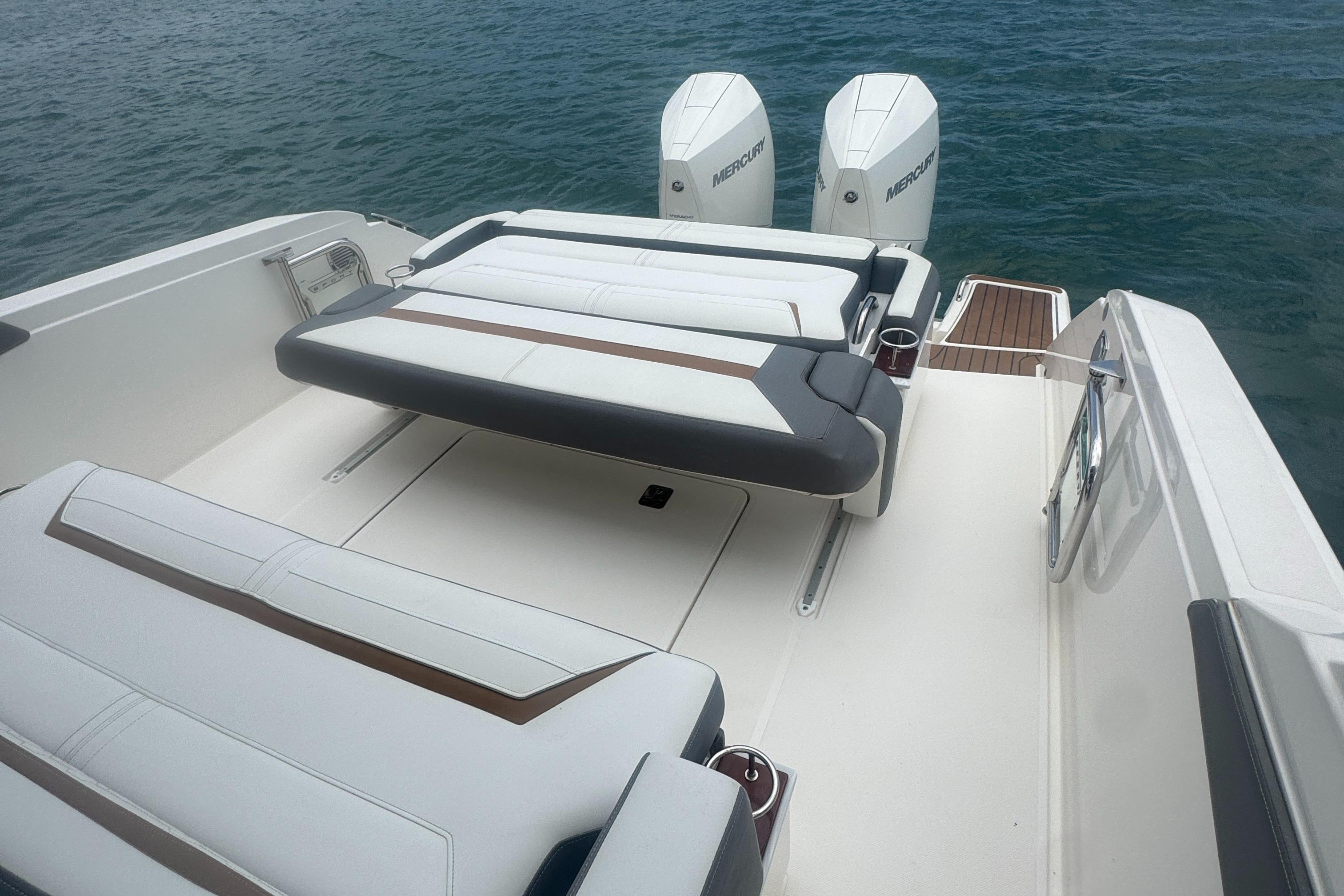 2020 Tiara Sport 34 LS boat with luxurious seating and dual Mercury engines.