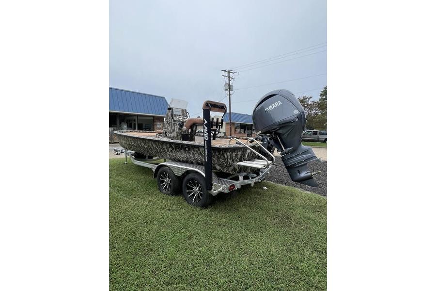2026 Avid 21 FSX boat on trailer with Yamaha outboard motor, parked on grass.