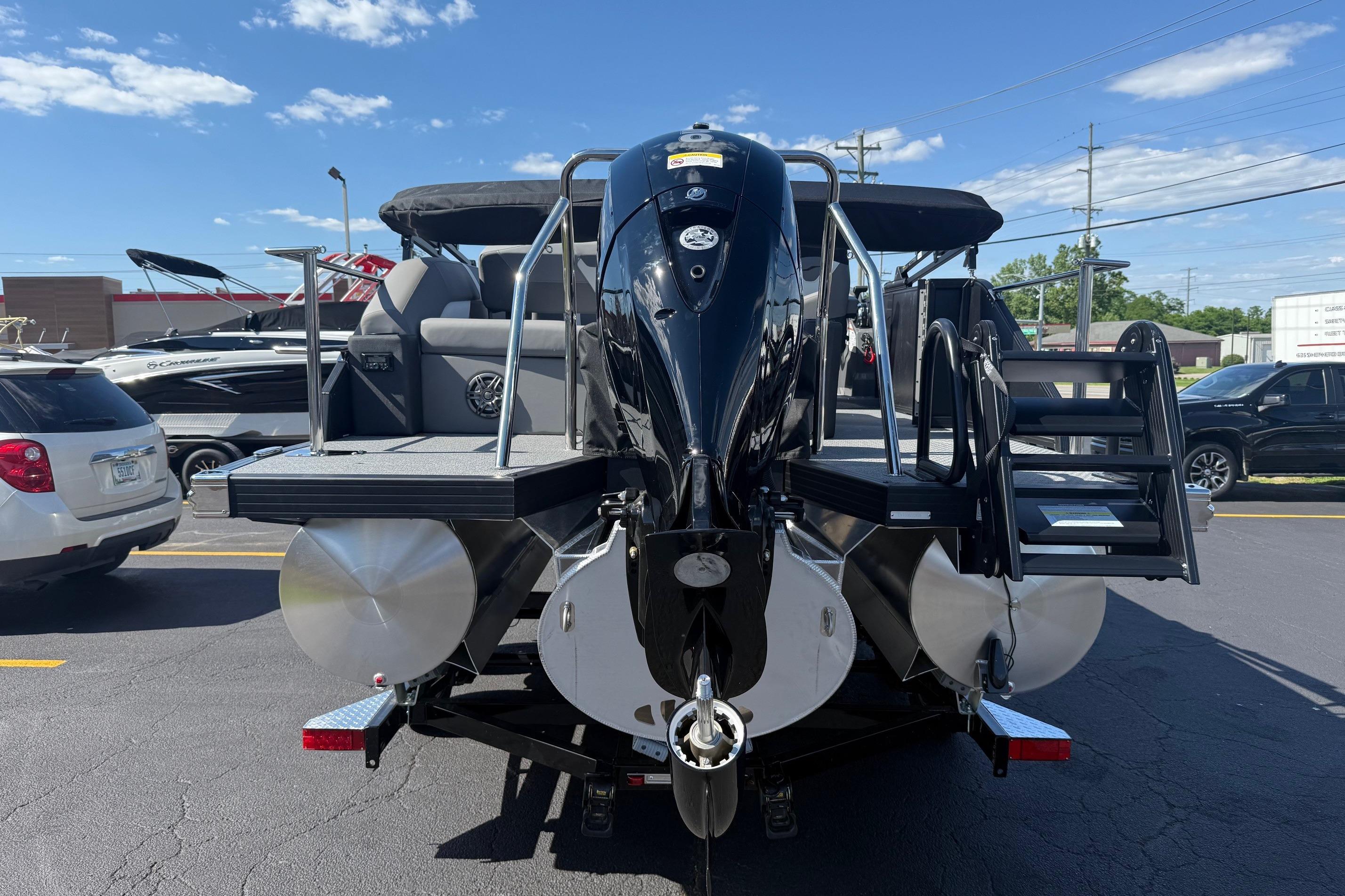 2026 Evotti 521CS pontoon boat with sleek design and powerful outboard motor.