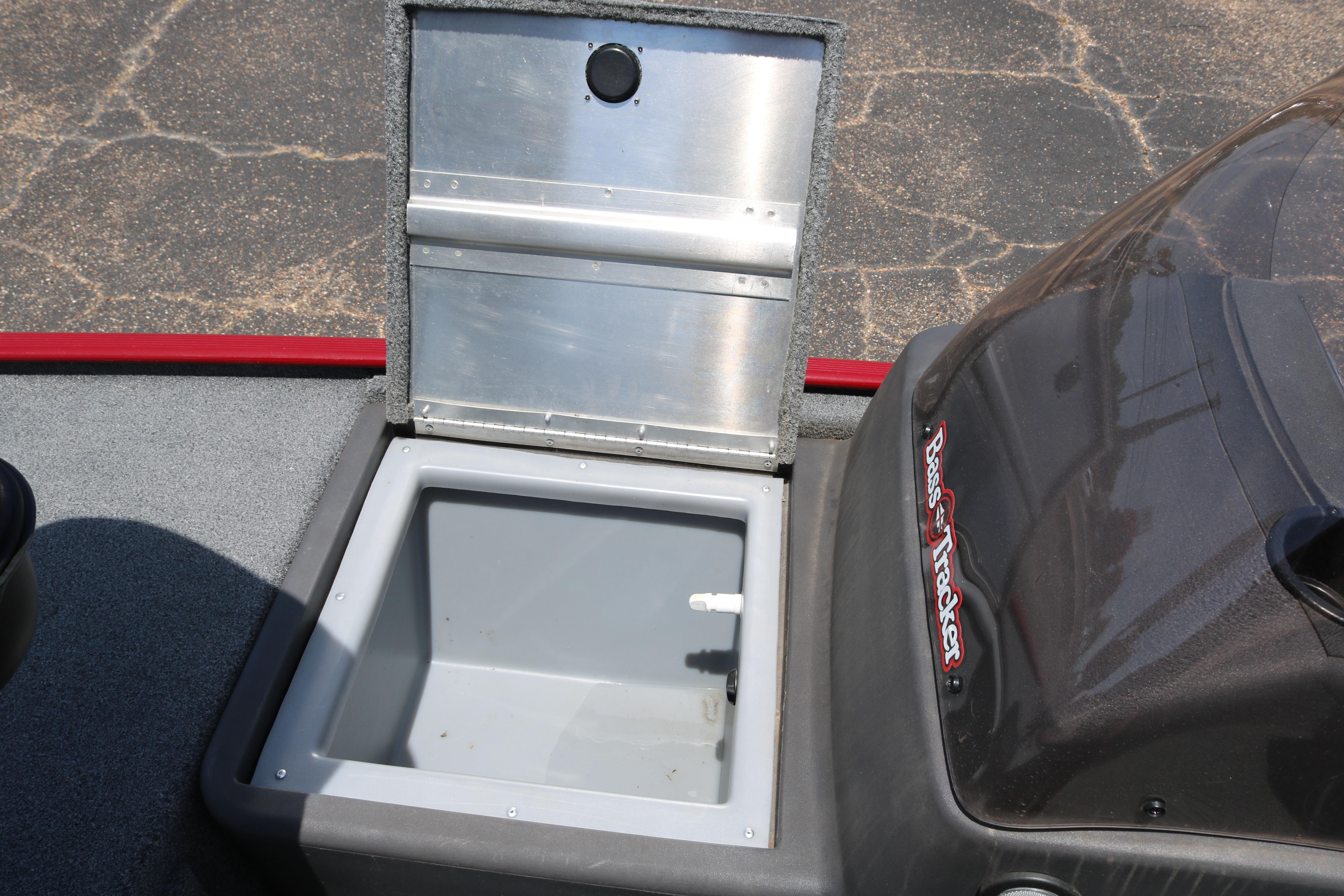 Open storage compartment on 2021 Tracker Bass Tracker Classic XL boat.