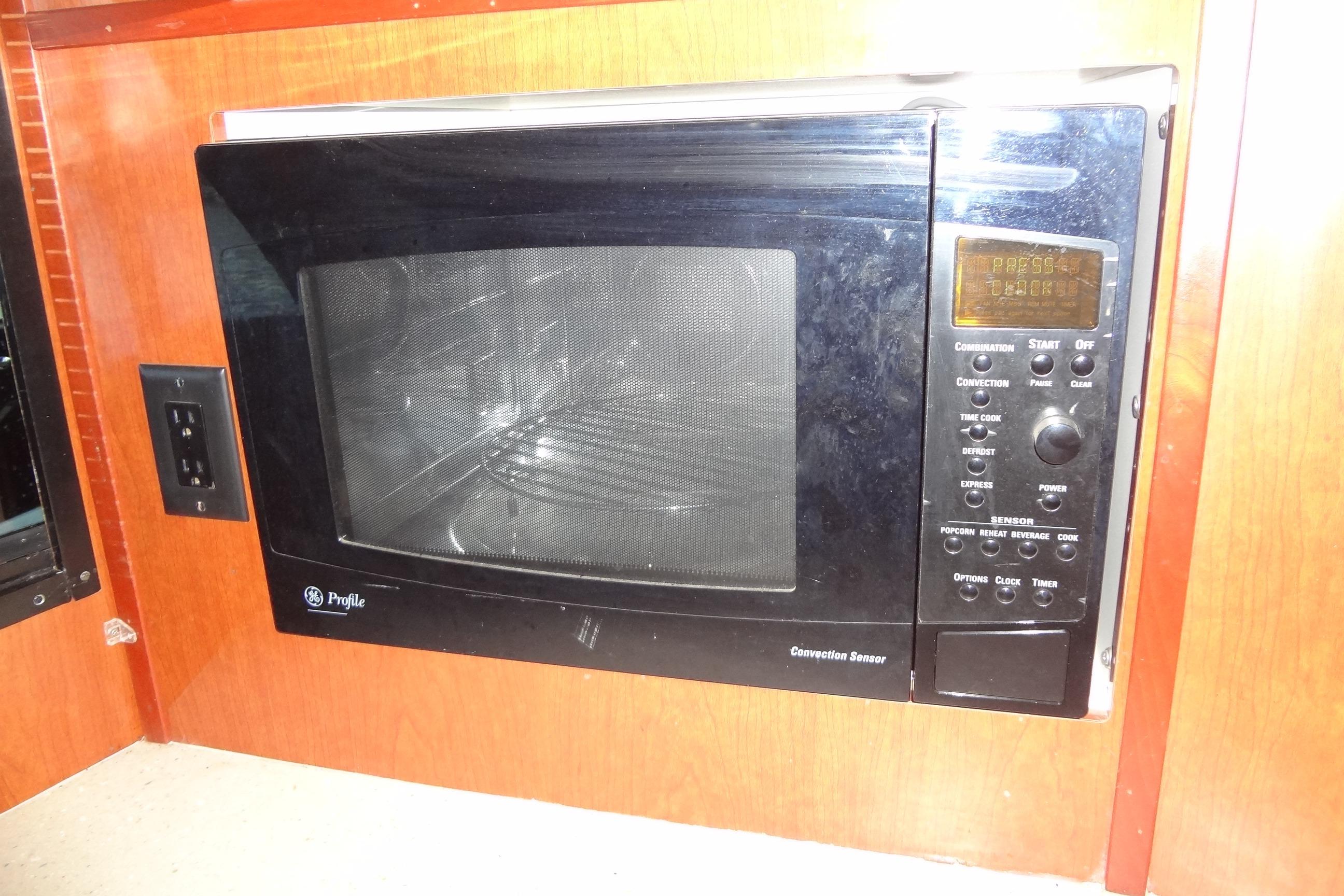 GE Profile microwave in 2008 Bluewater 5200 Signature Edition yacht kitchen.
