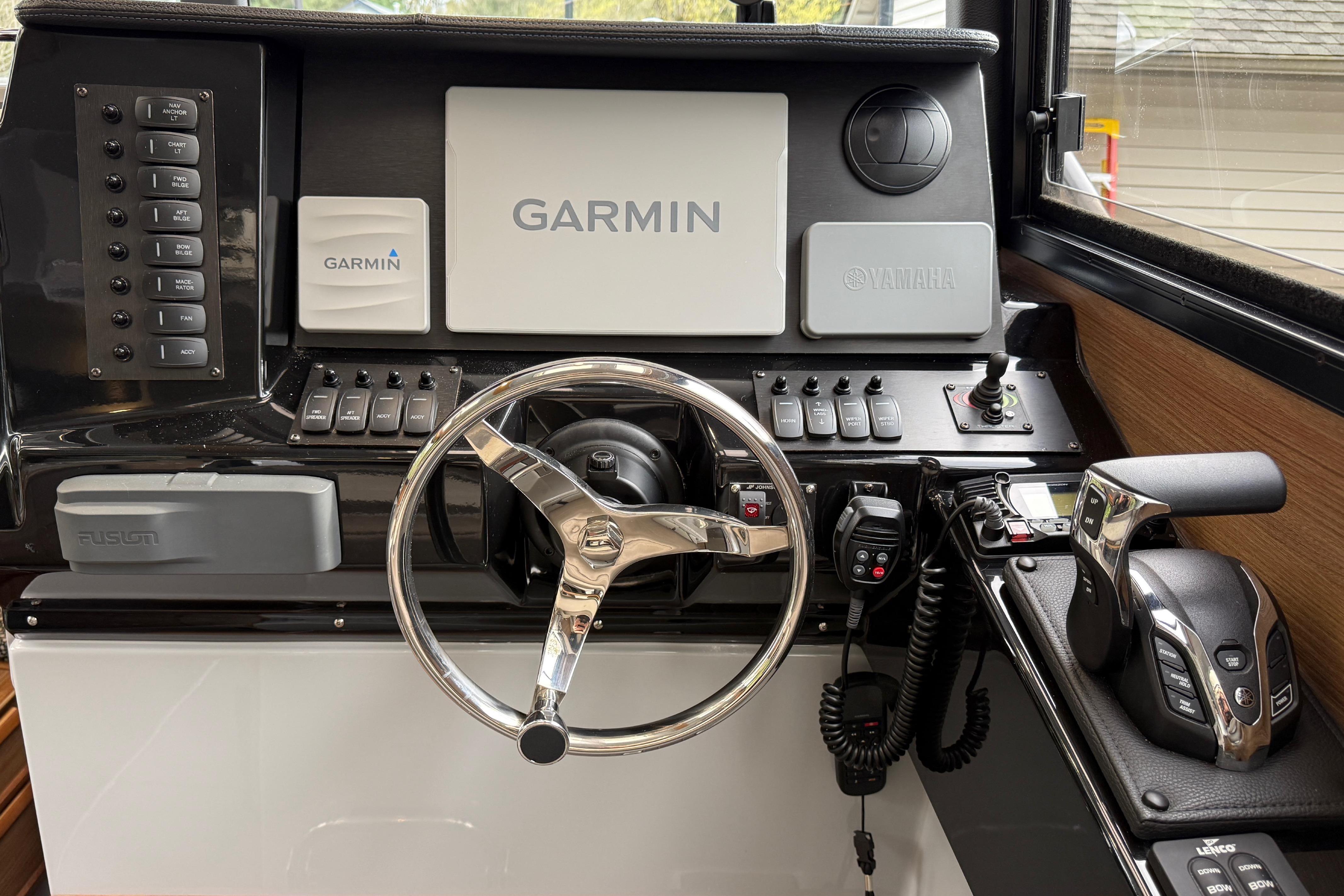 2024 Ranger Tugs R-27 helm with Garmin navigation system.