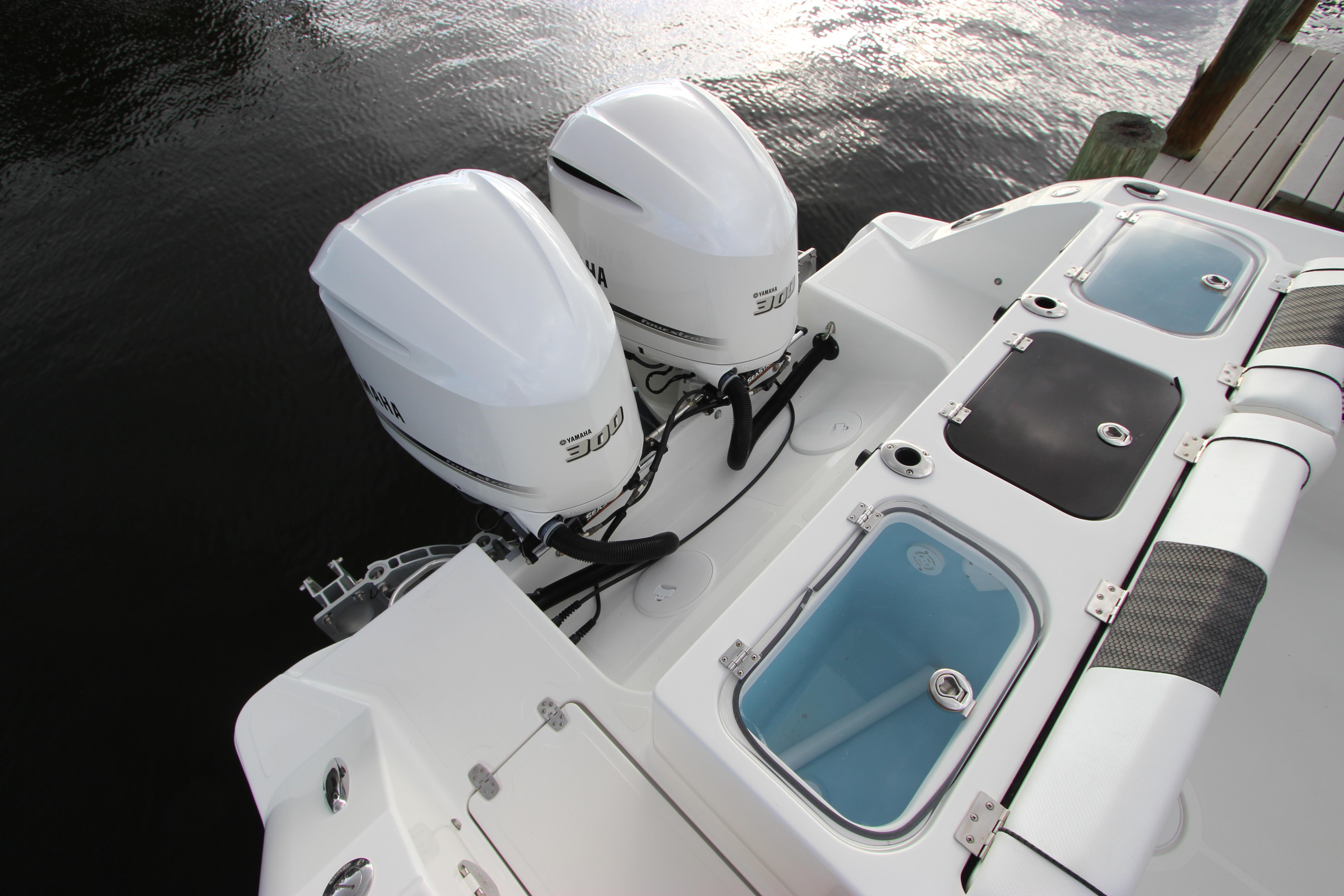 2020 Wellcraft 302 Fisherman boat with twin 300 horsepower engines.