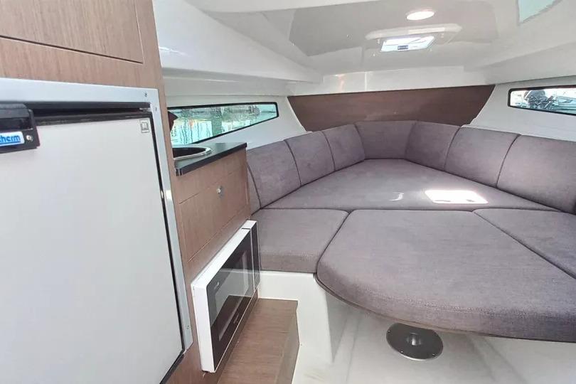 Interior of 2026 Beneteau Flyer 8 SUNdeck with cozy seating and modern amenities.