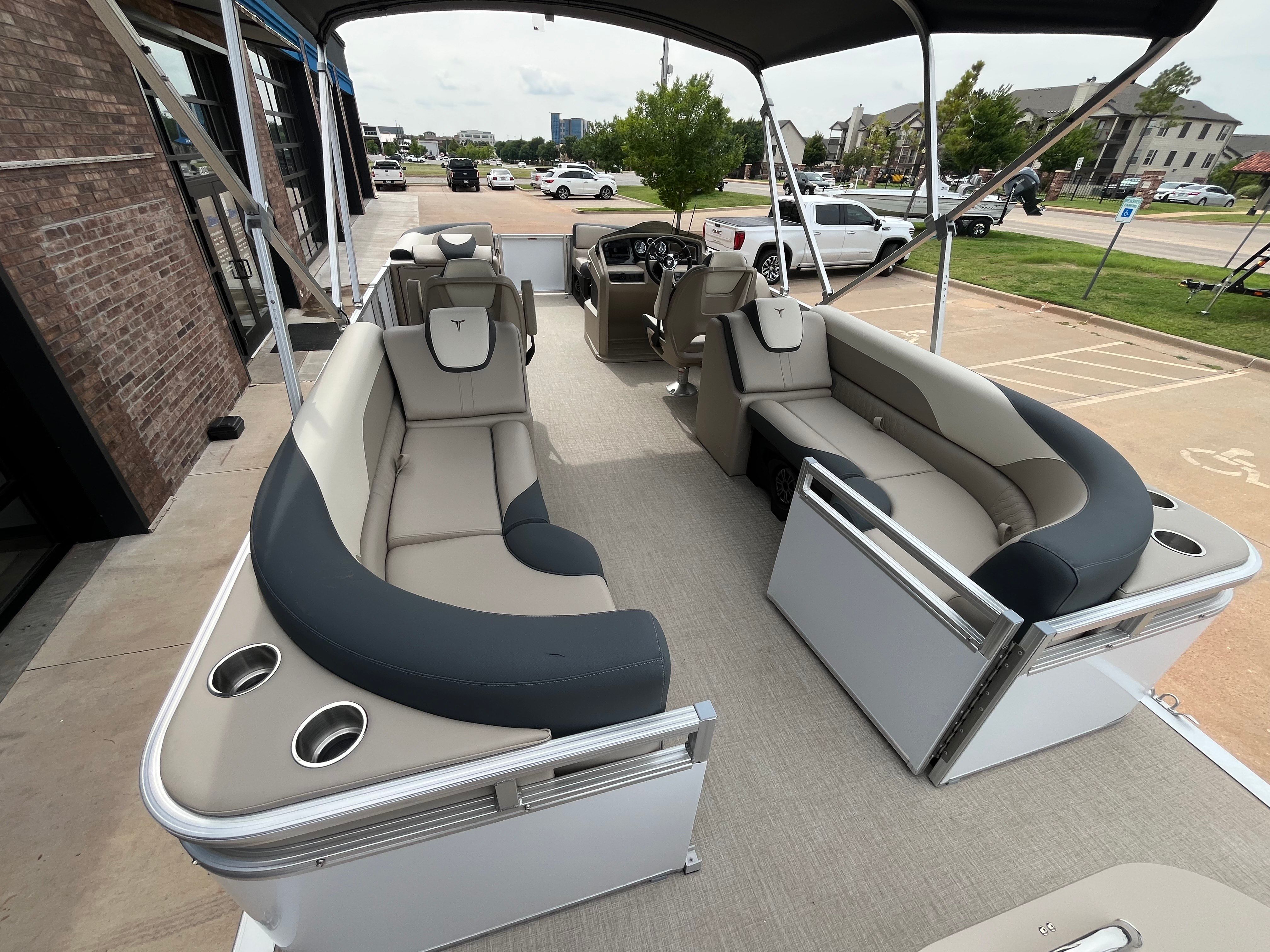 Interior of a 2025 Tahoe LTZ QL pontoon boat with luxurious seating.