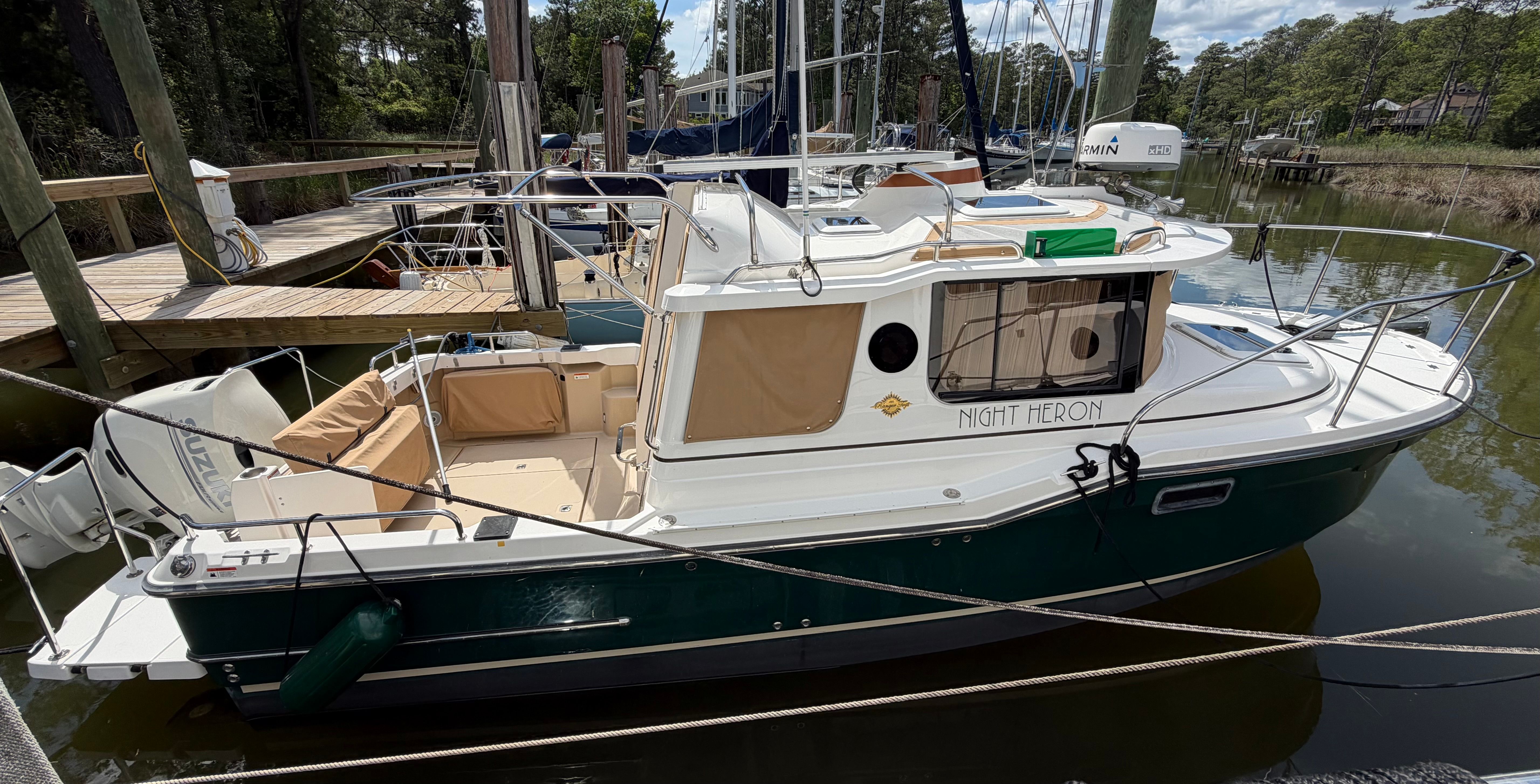 2018 Ranger Tugs R-23 boat docked at marina.