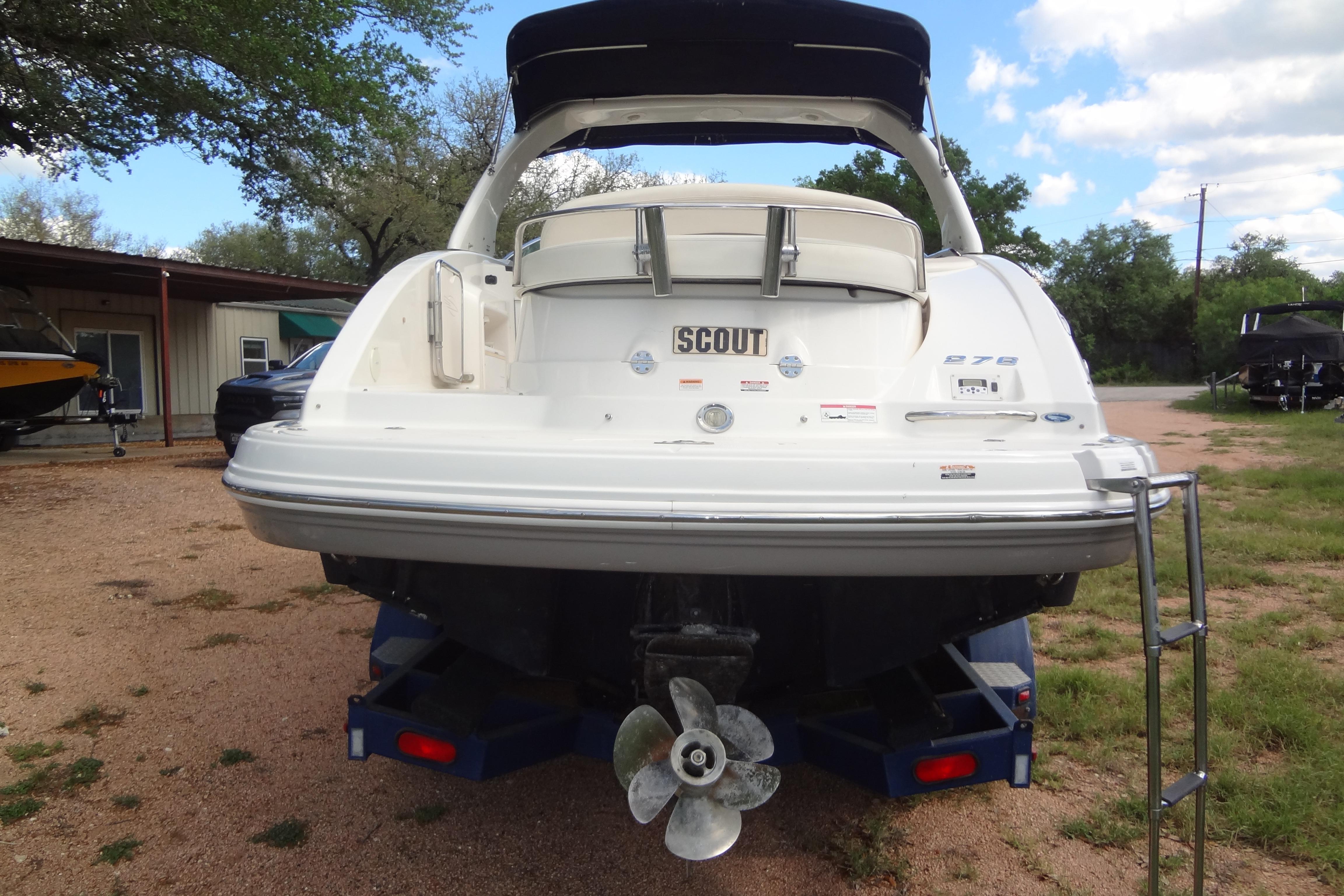 Rear view of a 2008 Chaparral 276 SSX boat on a trailer.