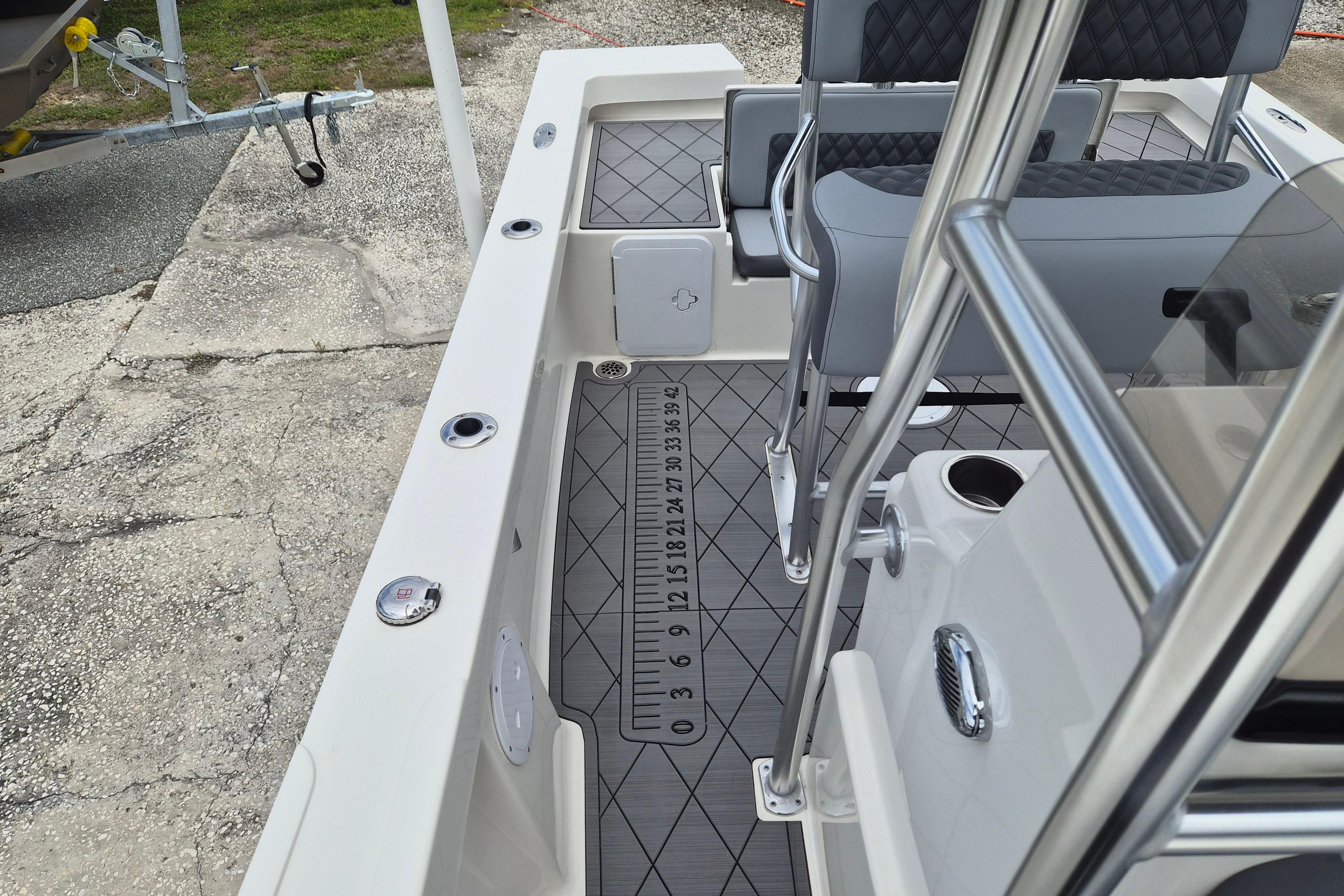 2026 Defiance Catalina 190 boat interior with seating and measurement markings.