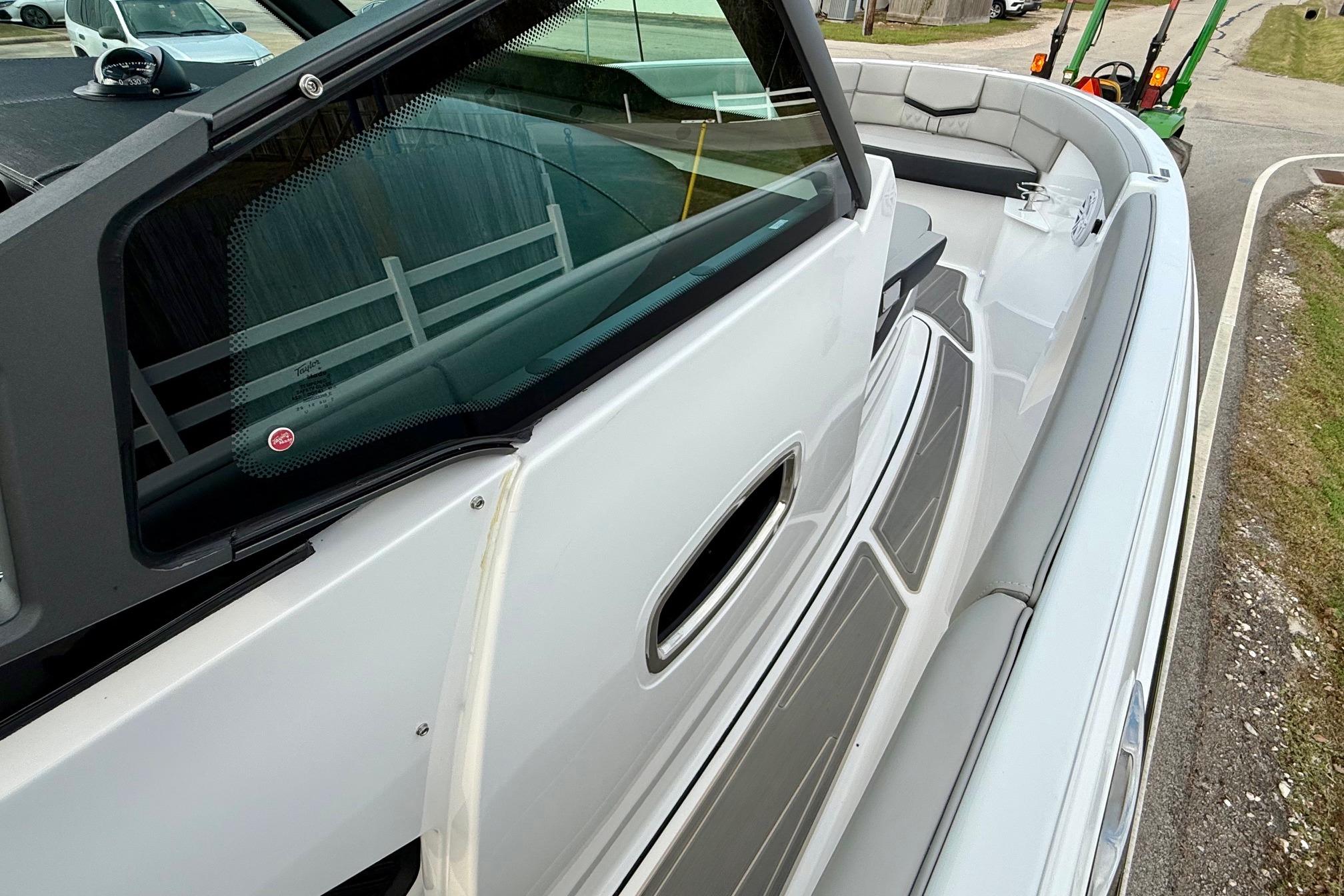 2026 Monterey Elite 25 OB boat interior with sleek seating and modern design.