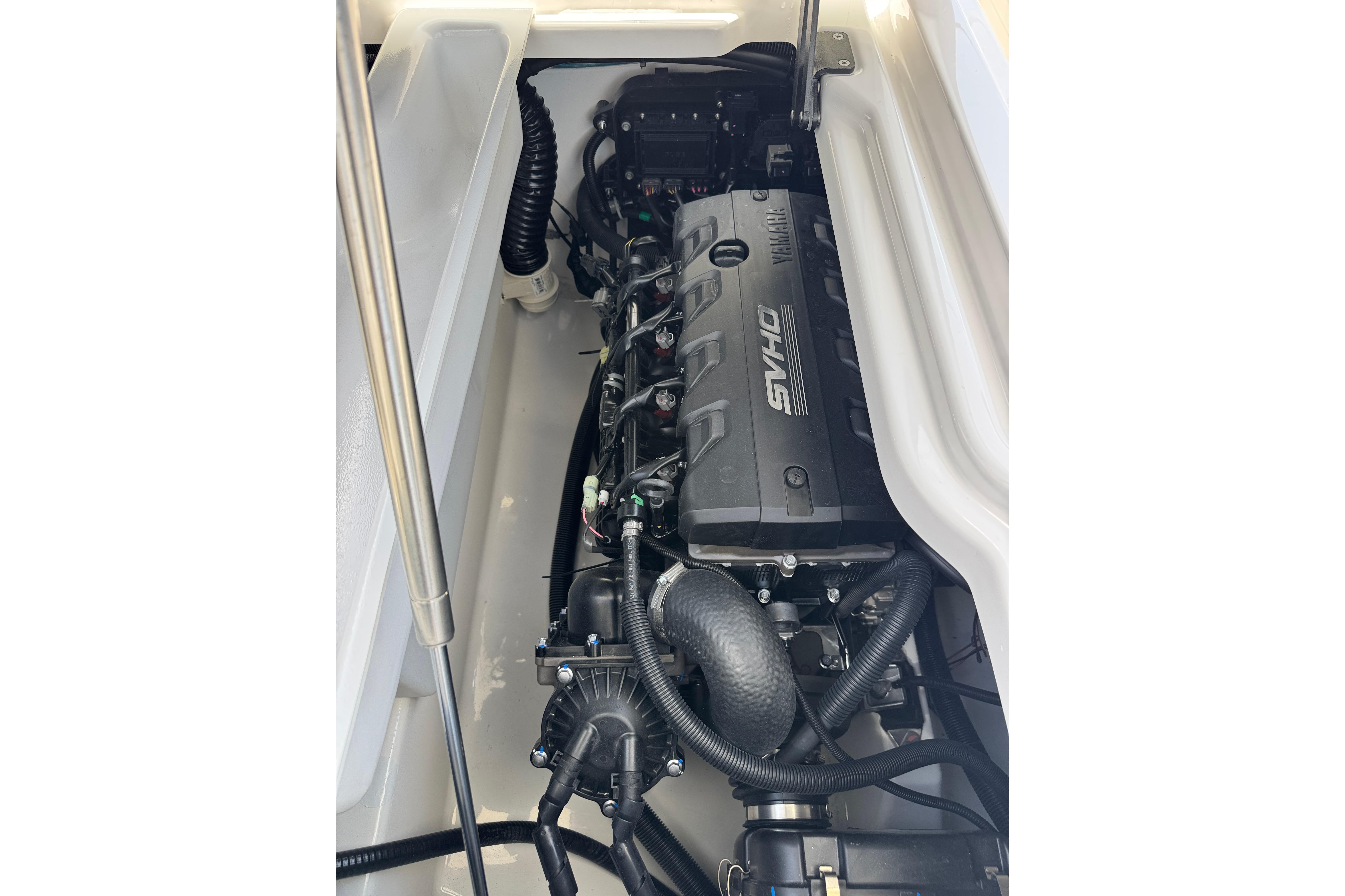 Engine compartment of 2026 Yamaha Boats 275SD, featuring a powerful SVHO engine.