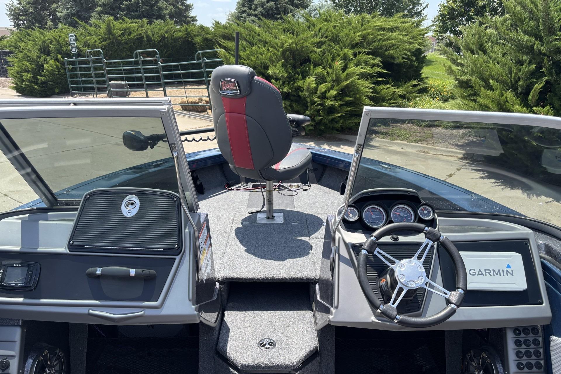 2021 Ranger VX1788 WT boat interior with steering wheel and Garmin navigation system.