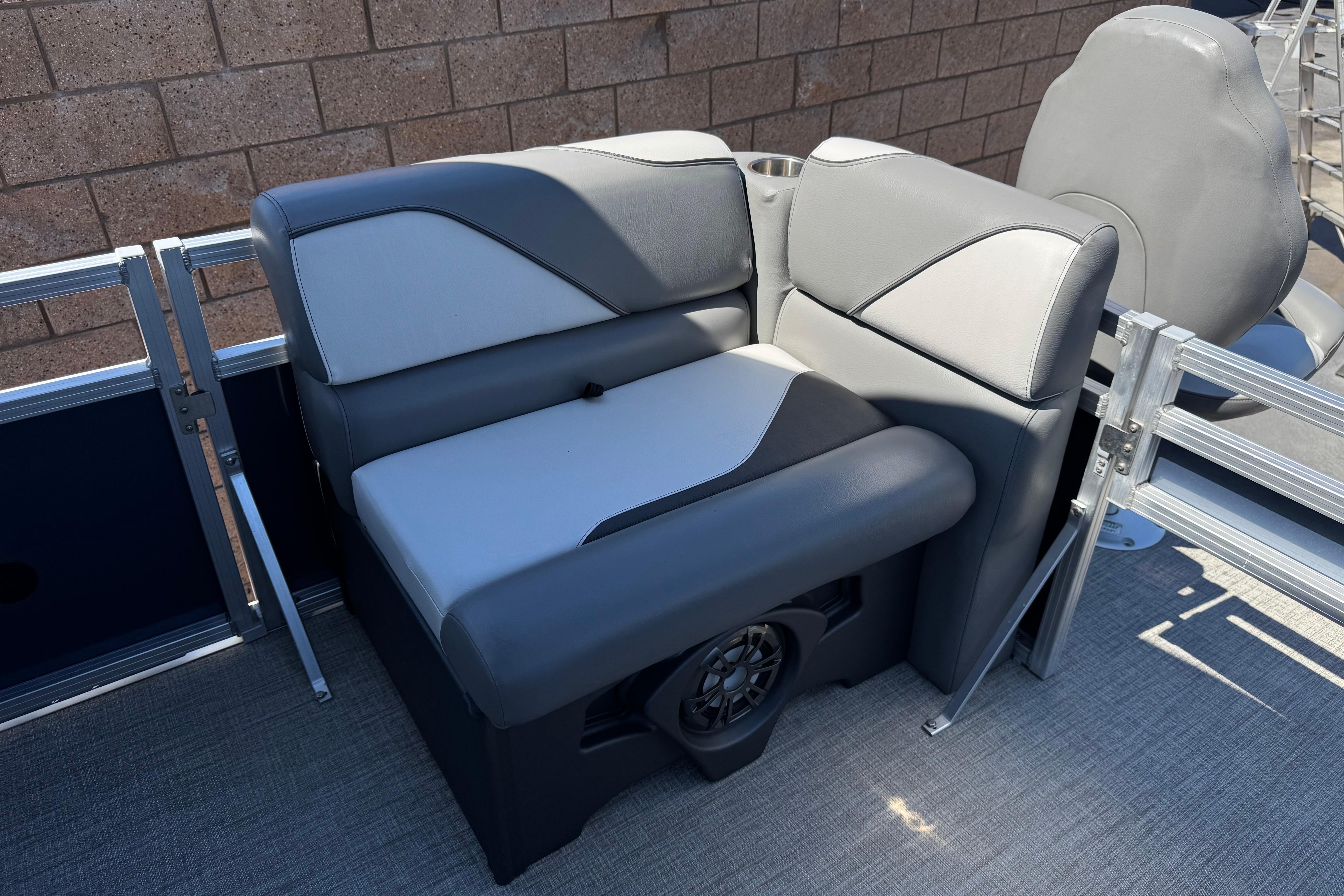 2023 Avalon Venture Fish N Cruise 20' boat interior with gray seating and speaker.