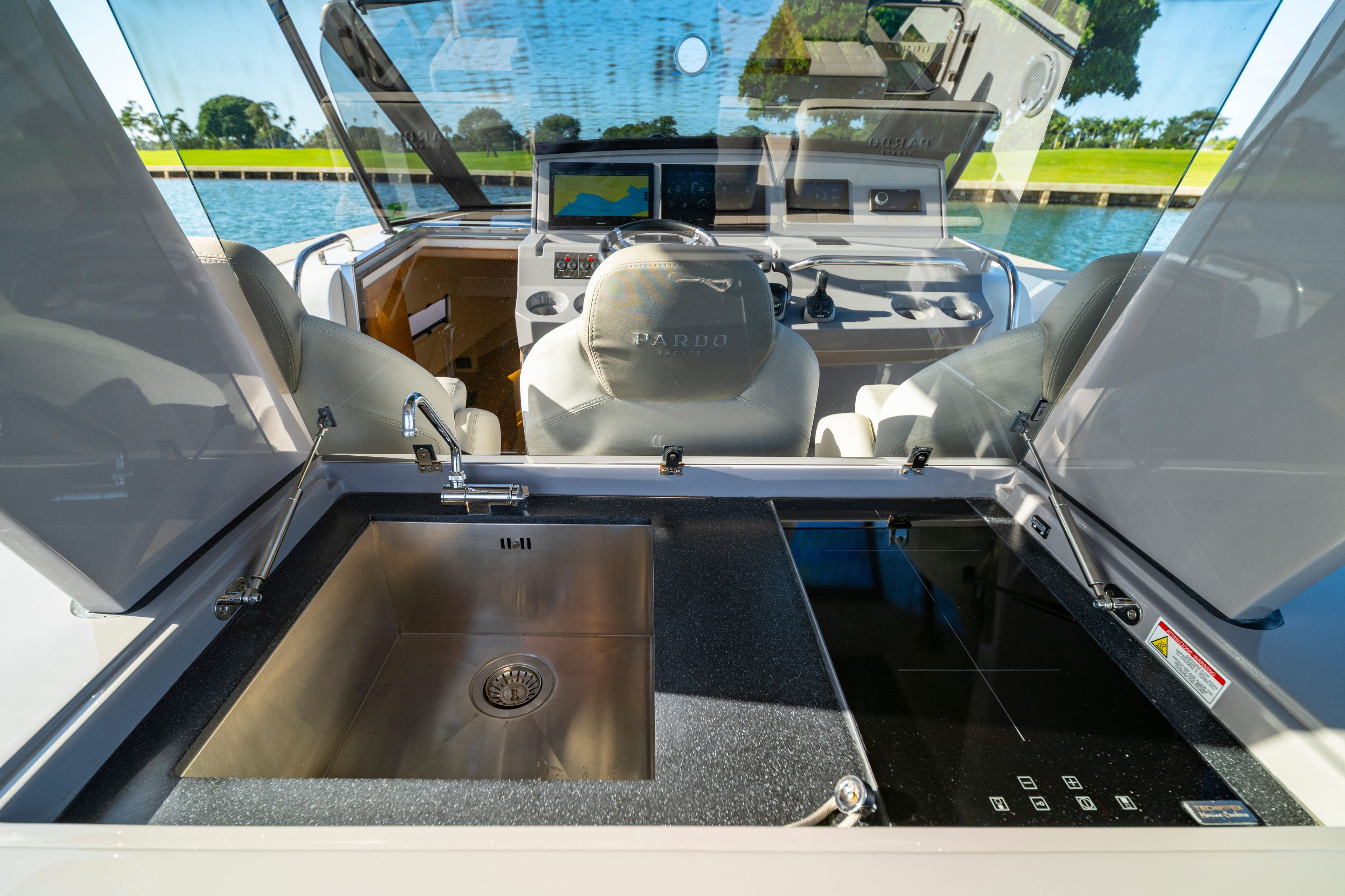 2024 Pardo Yachts P43 interior with modern kitchen sink and cockpit view.