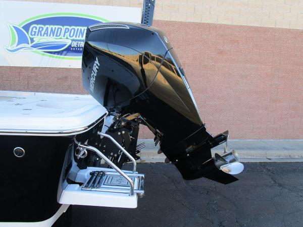 2025 Sea Pro 230 Bay with Mercury outboard motor, displayed at Grand Pointe Marina.