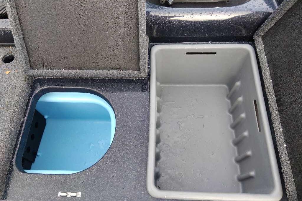 Nitro ZV19 2025 boat storage compartments, featuring blue and gray interior sections.