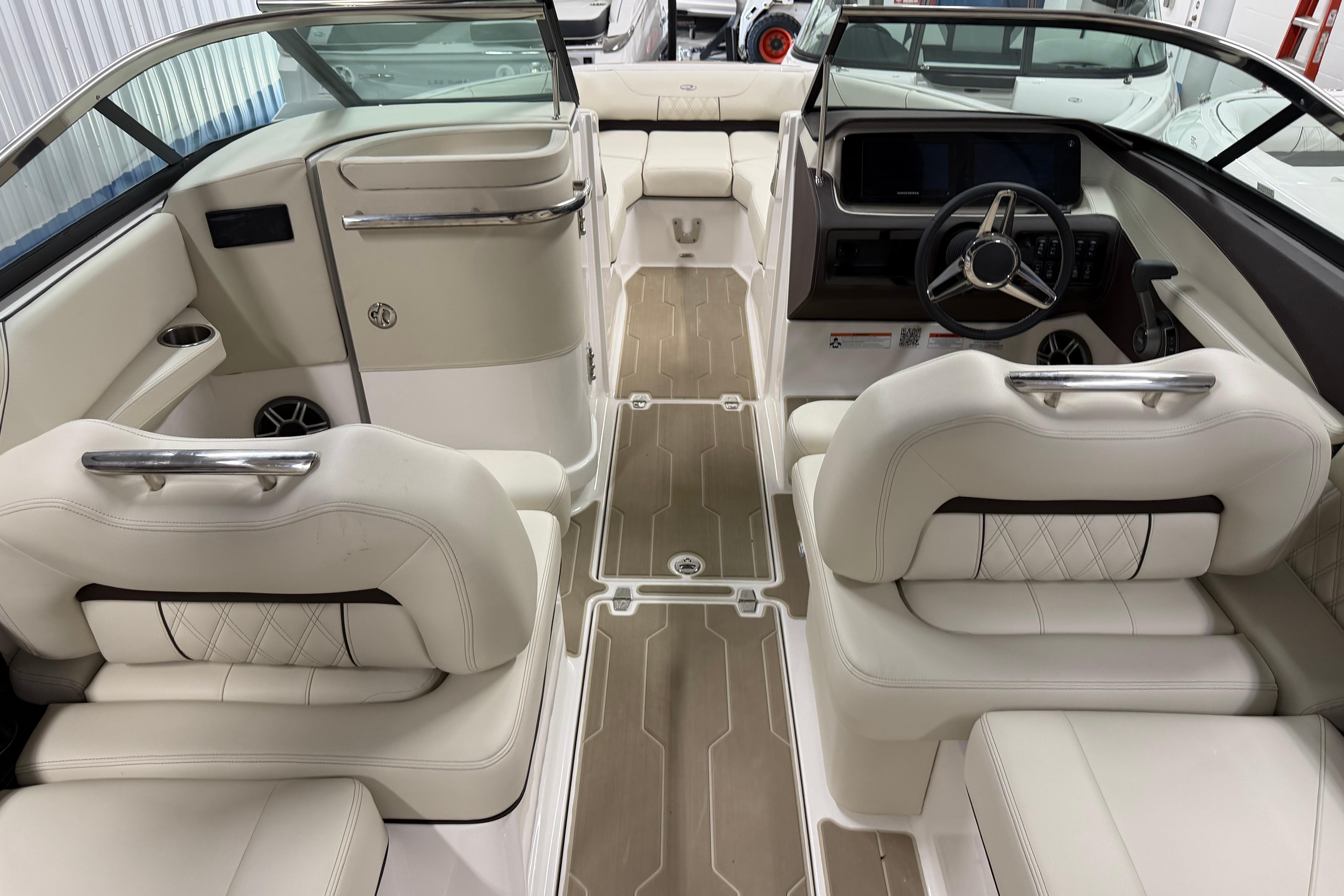 Luxurious interior of 2026 Regal LS6 boat with plush seating and modern dashboard.