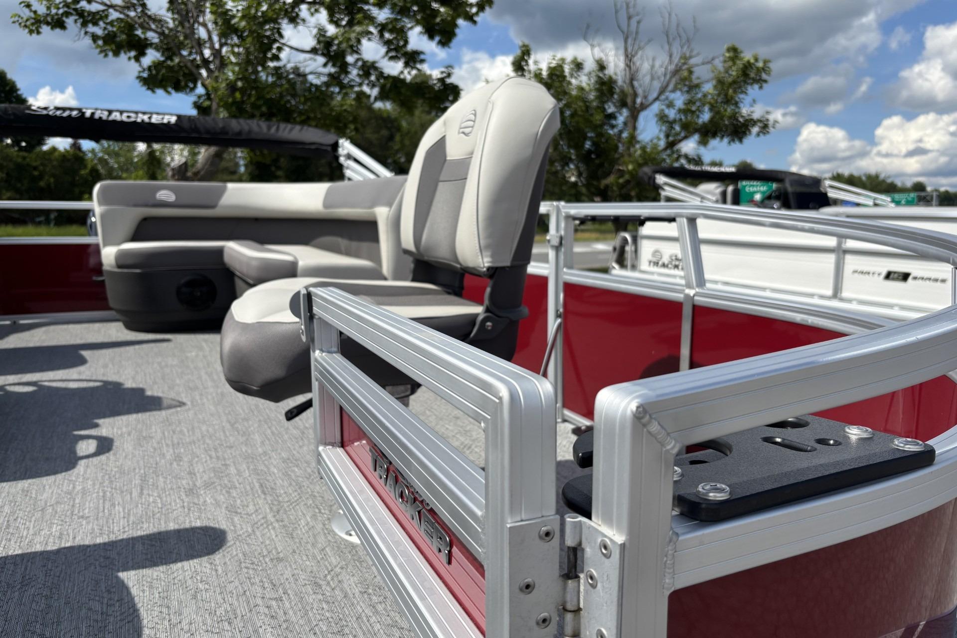 2026 Sun Tracker Bass Buggy 16 XL Select pontoon boat with comfortable seating and sleek design.