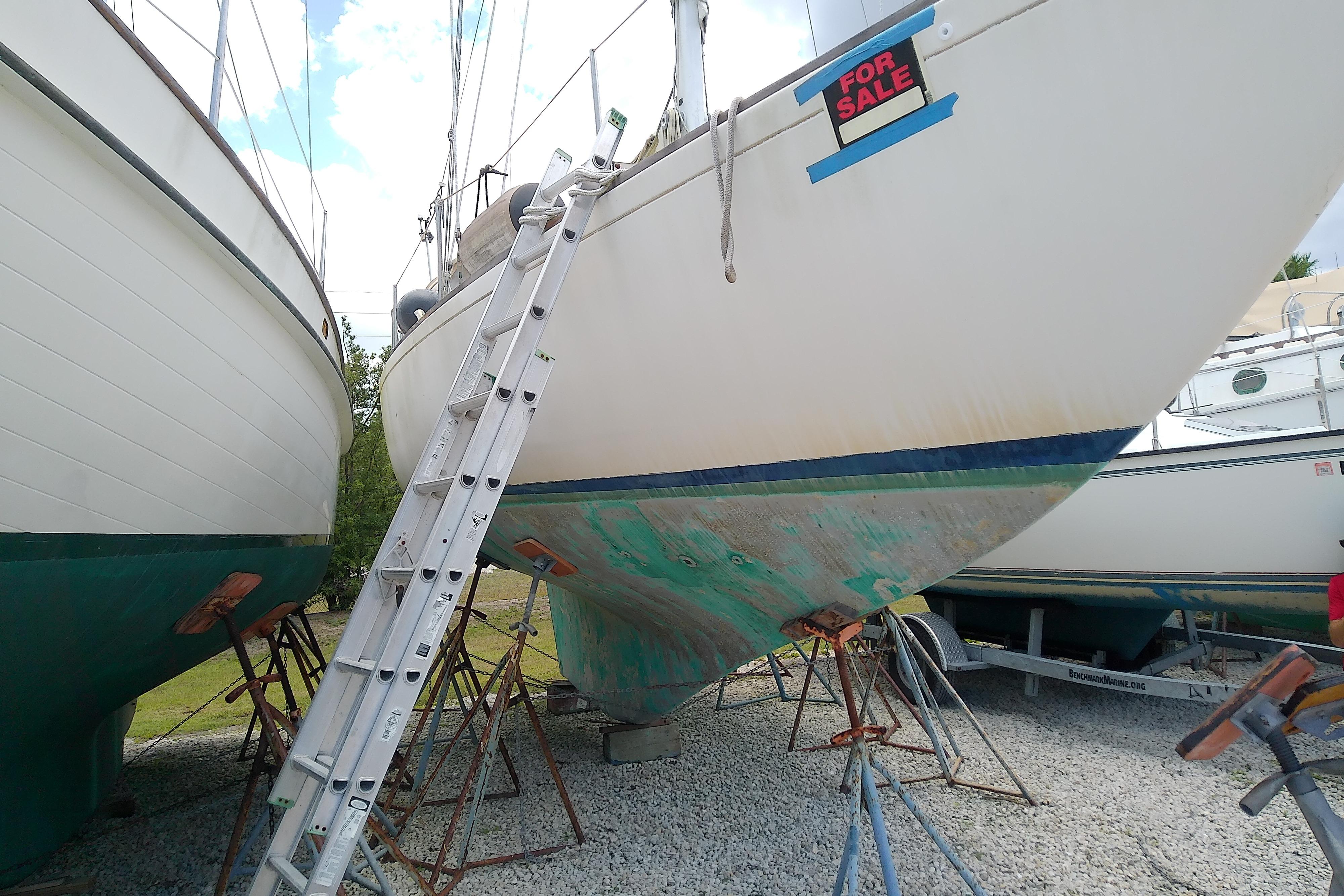 1981 Sea Sprite 34 sailboat on stands, for sale, with ladder access.