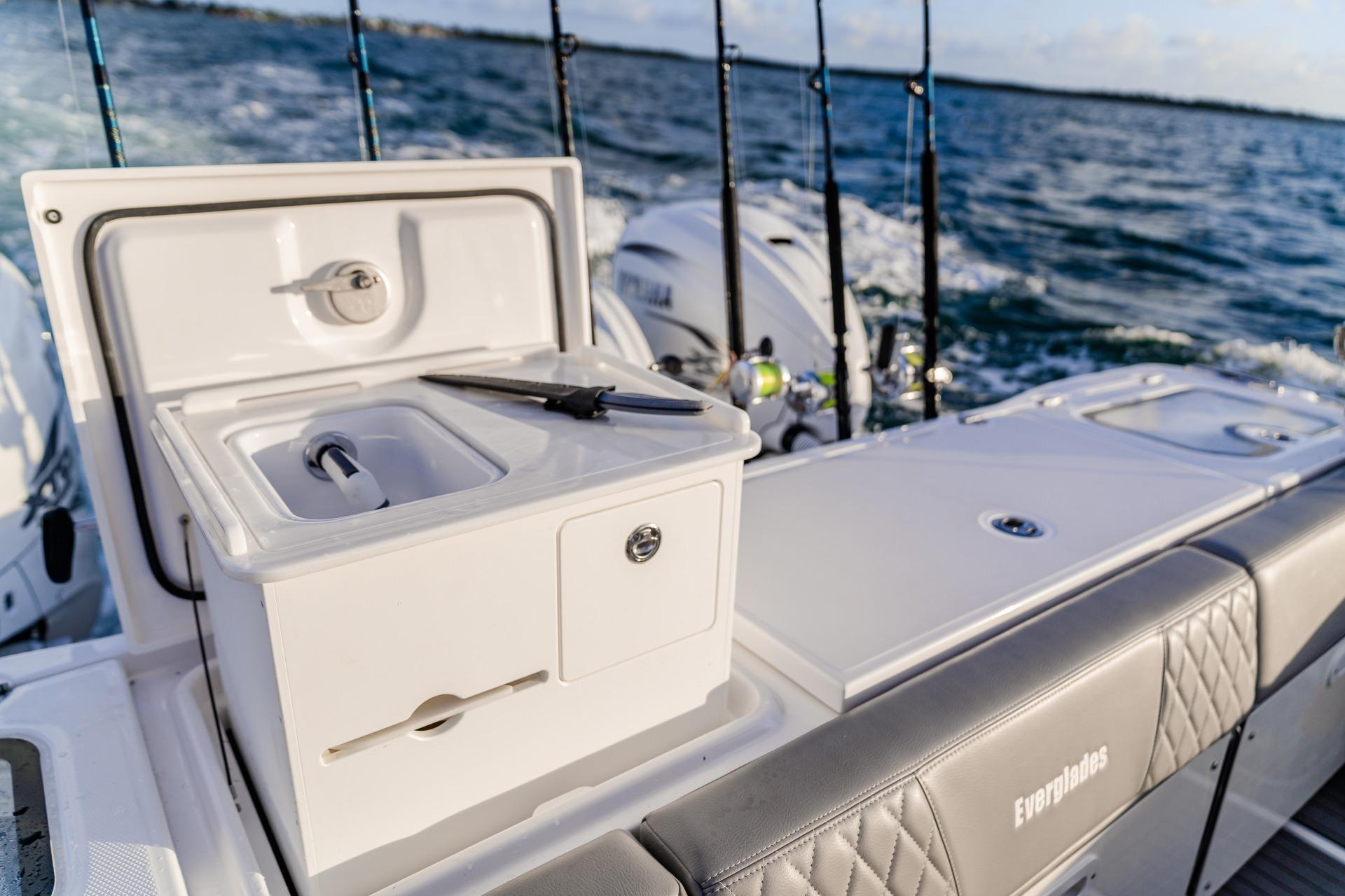 2026 Everglades 455 Center Console boat with fishing gear on open water.