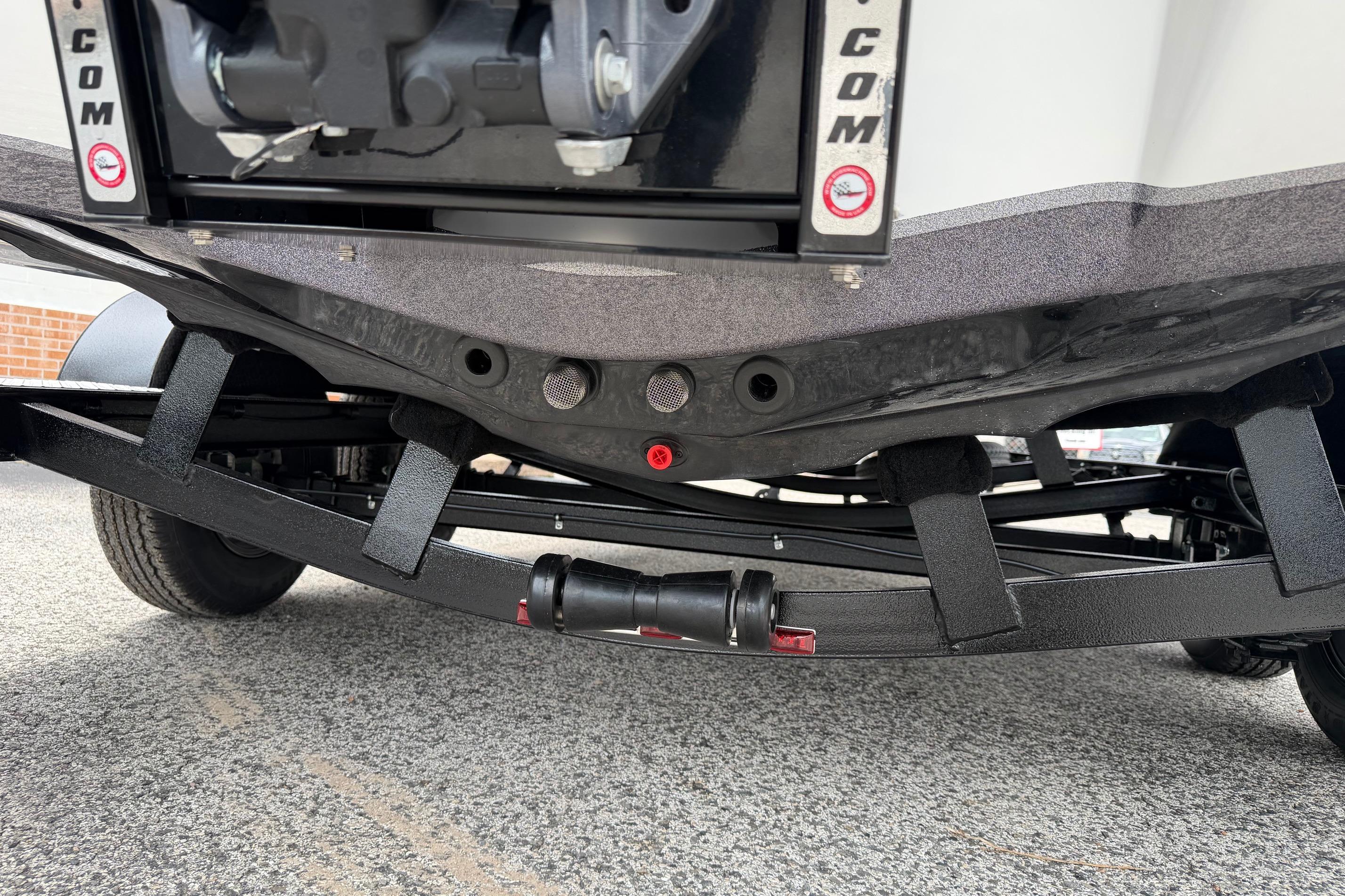 2027 Falcon Boats F215 trailer undercarriage with suspension details.