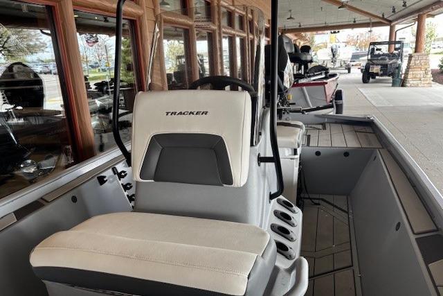 2026 Tracker Bass Tracker Classic CC boat interior with seating and controls.