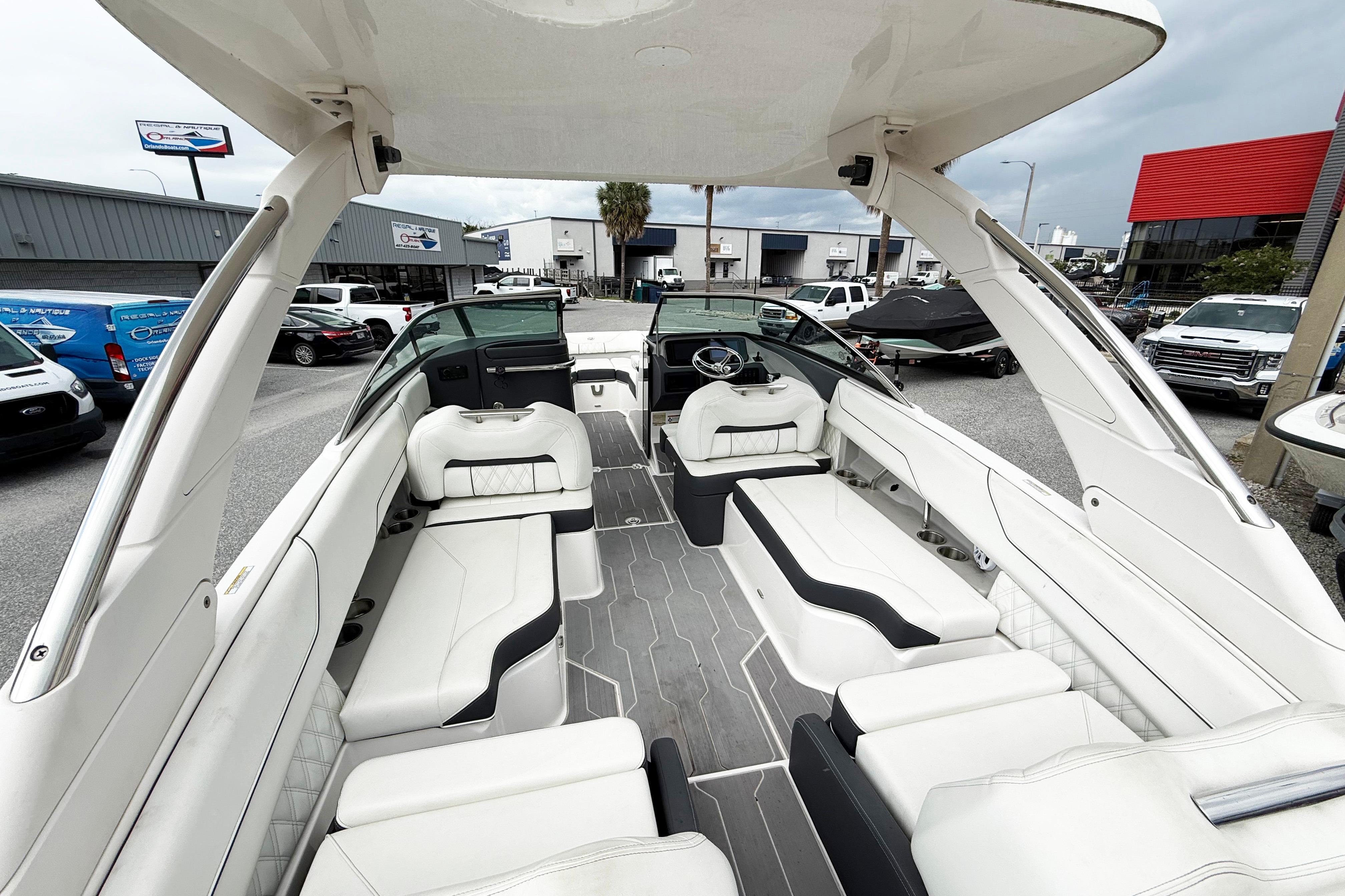 2024 Regal LX4 boat interior with luxurious white seating and modern design.