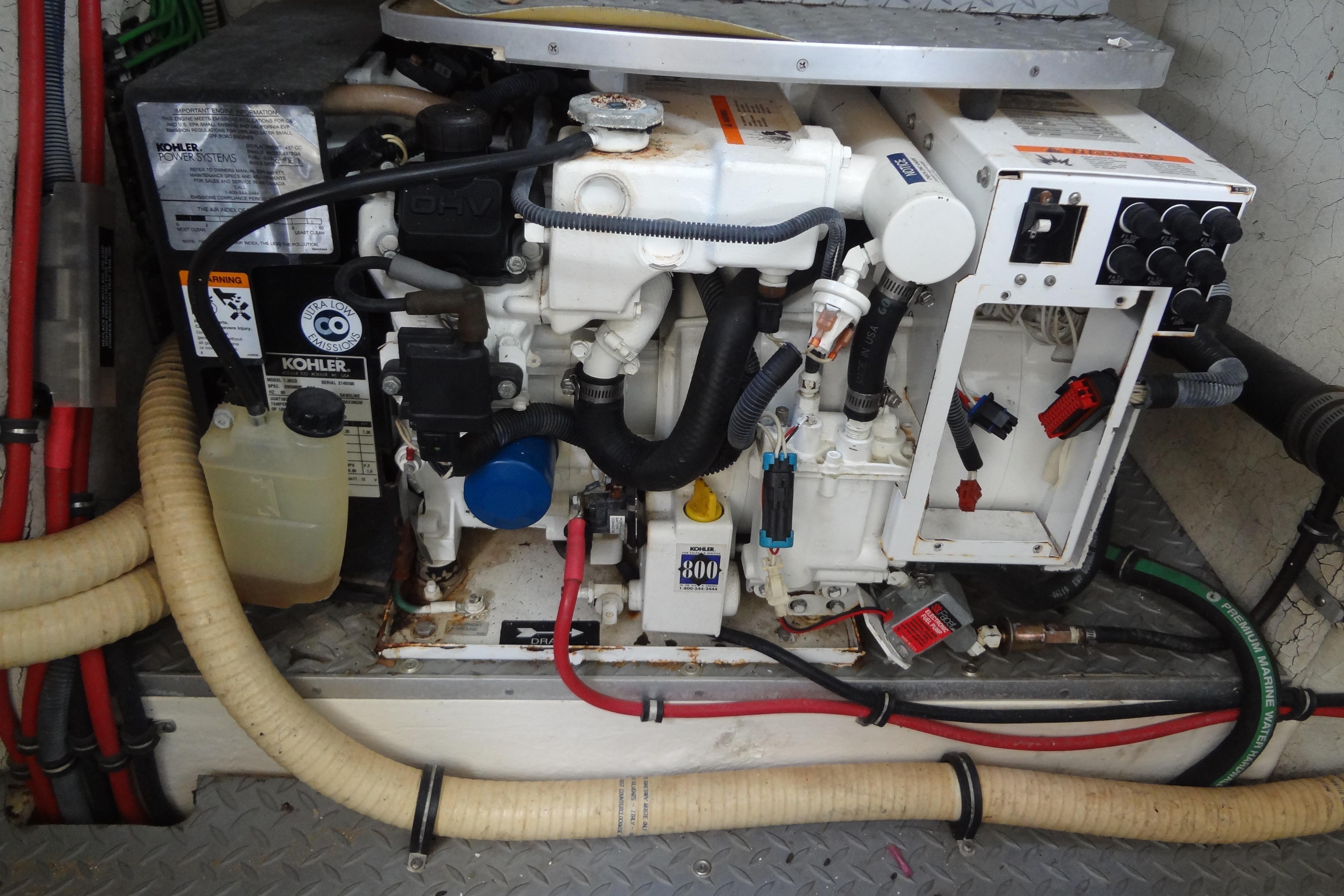 Engine compartment of a 2007 Formula 34 Performance Cruiser with Kohler power system.