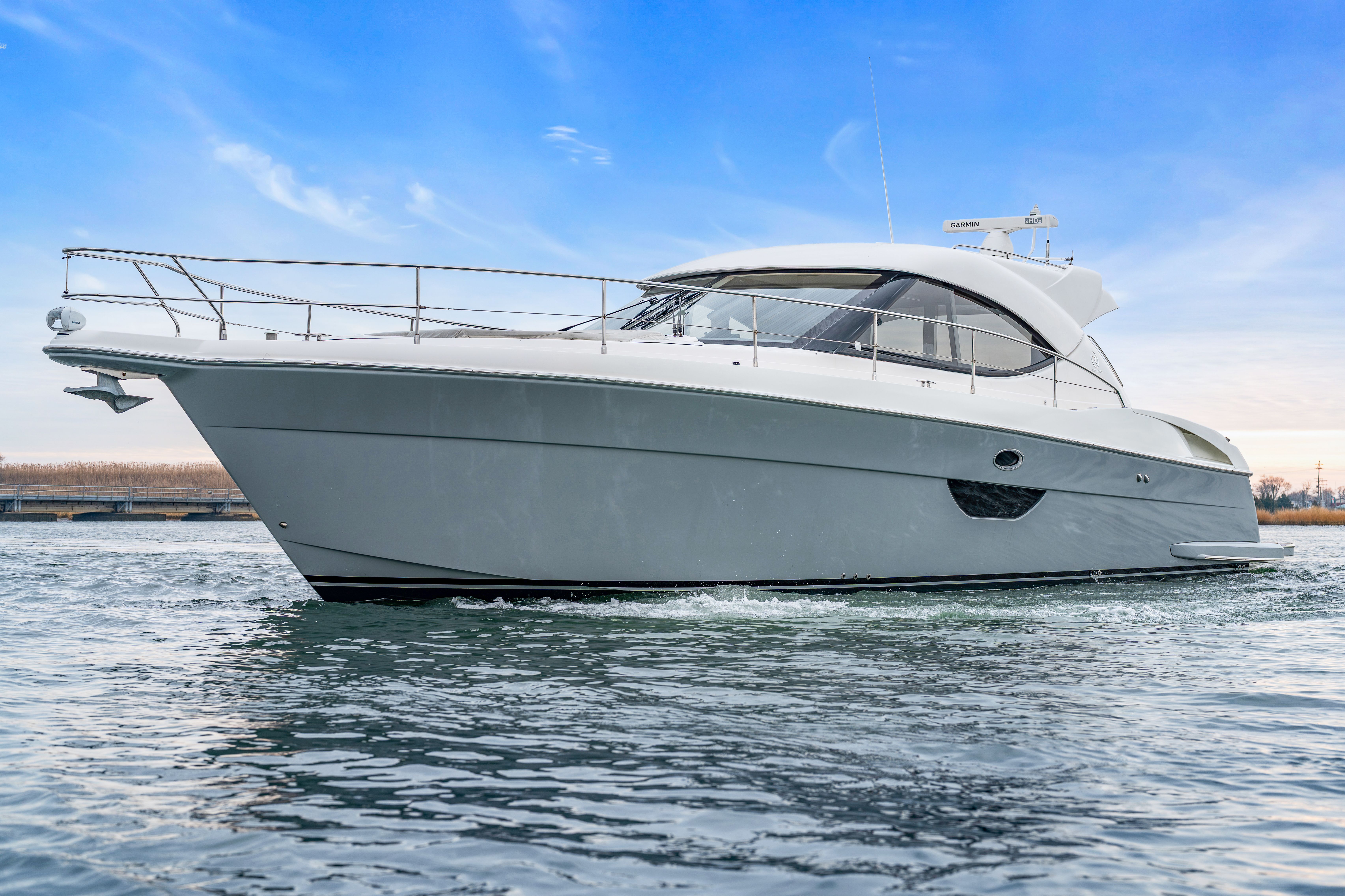 2014 Riviera 44 Sport Yacht on calm water.