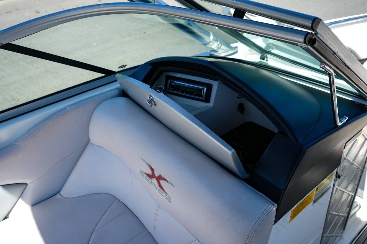 The image shows the cockpit of a 2007 MasterCraft X-45 boat with a modern dashboard.