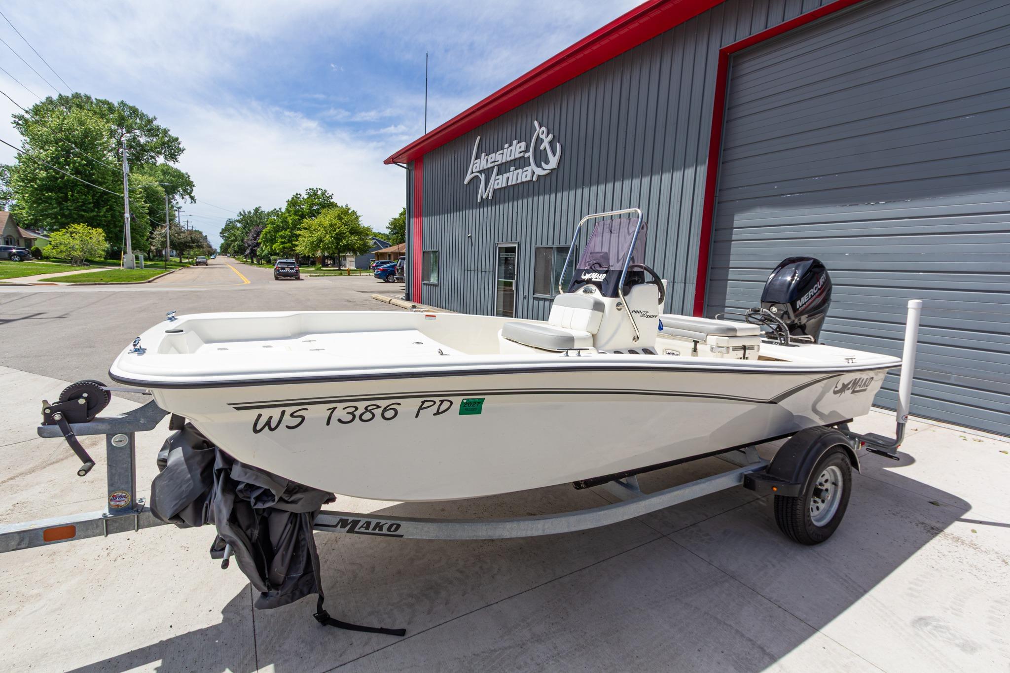 2020 Mako Pro Skiff 15 CC boat on trailer outside Lakeside Marina.