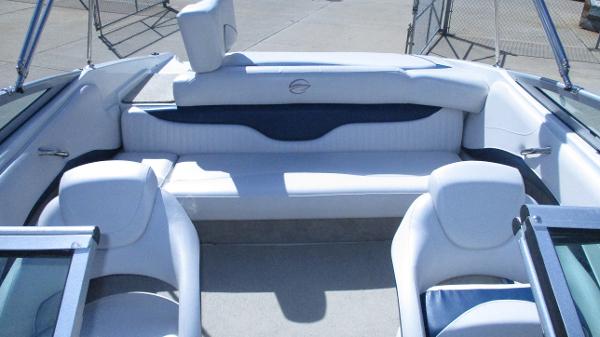 2012 Crownline 21 SS boat interior with white seating and blue accents.