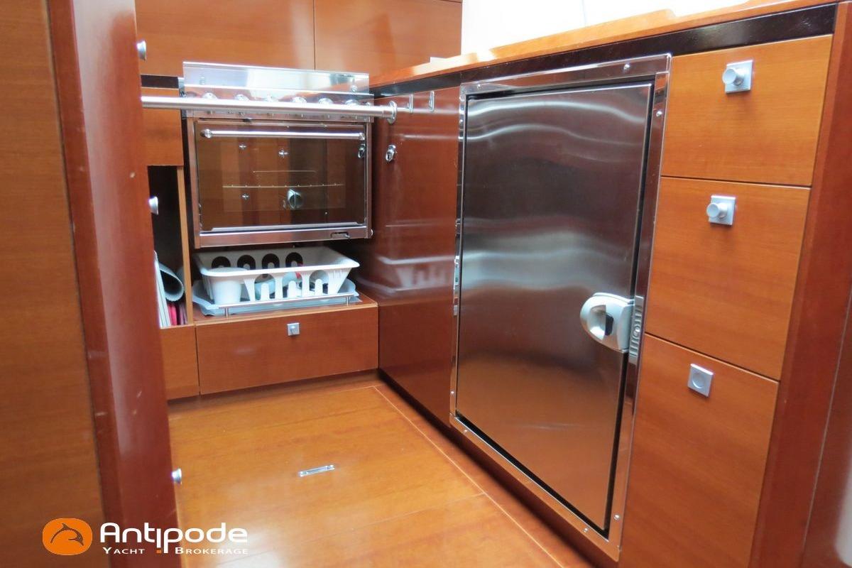 Luxurious kitchen interior of 2012 CNB BORDEAUX 60 yacht with modern appliances.