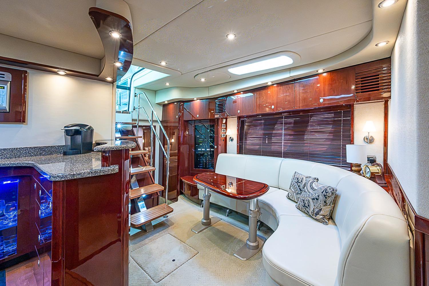 Luxurious interior of 2008 Sea Ray 60 Sundancer yacht with elegant seating and modern amenities.