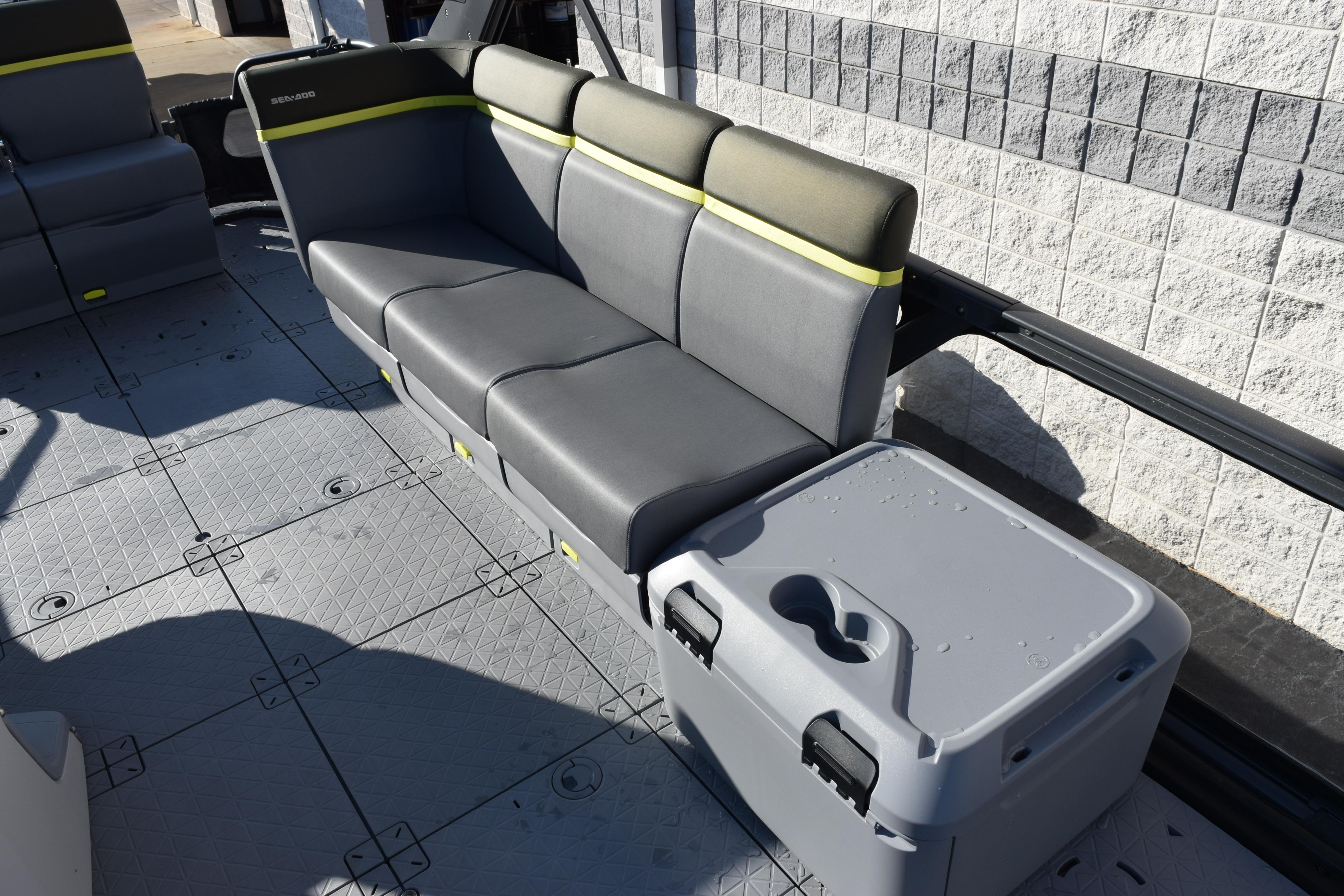 2026 Sea-Doo Switch Fish 21 interior with gray seating and storage compartment.
