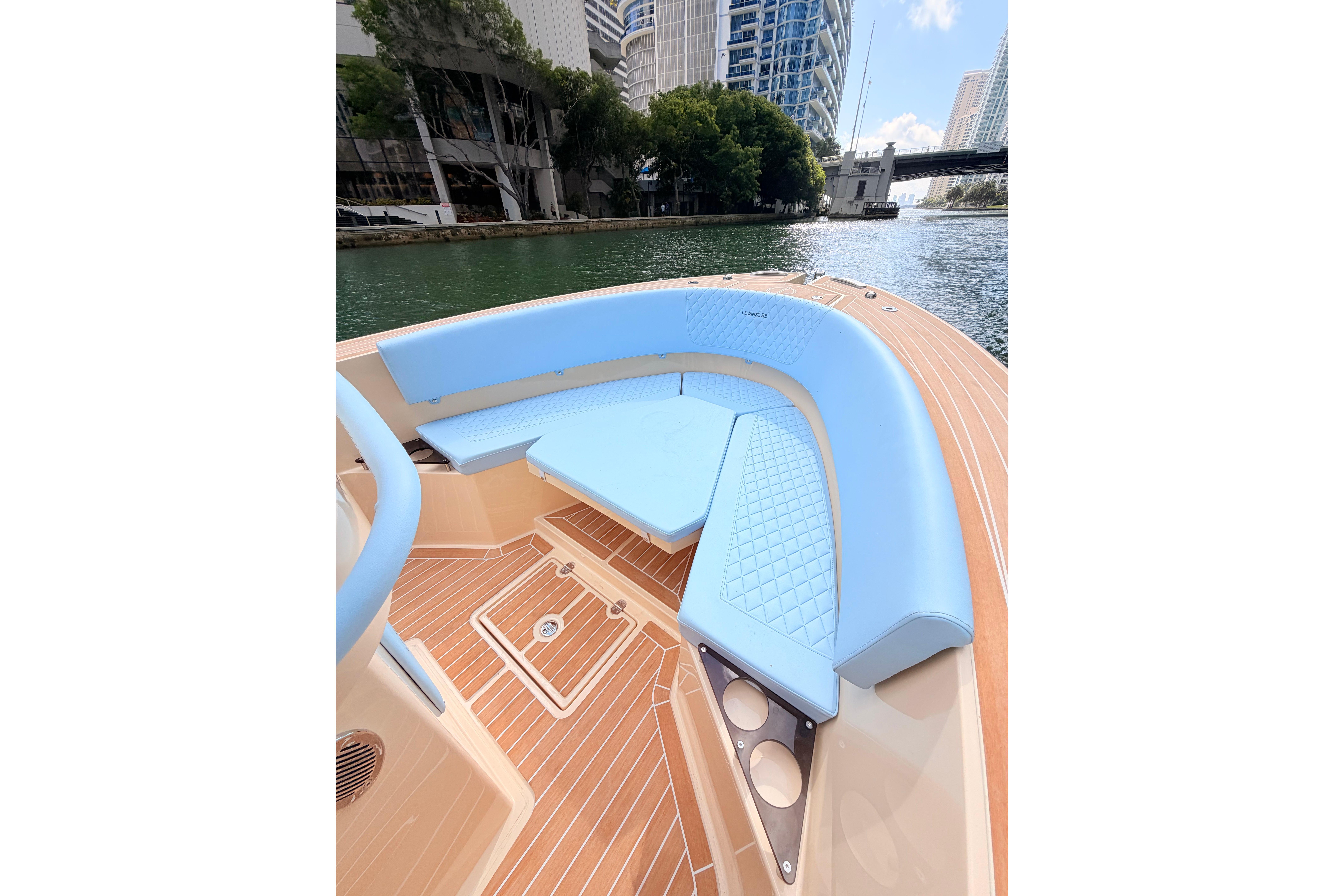 Luxurious Lilybaeum Levanzo 25 boat interior with blue seating, 2026 model.