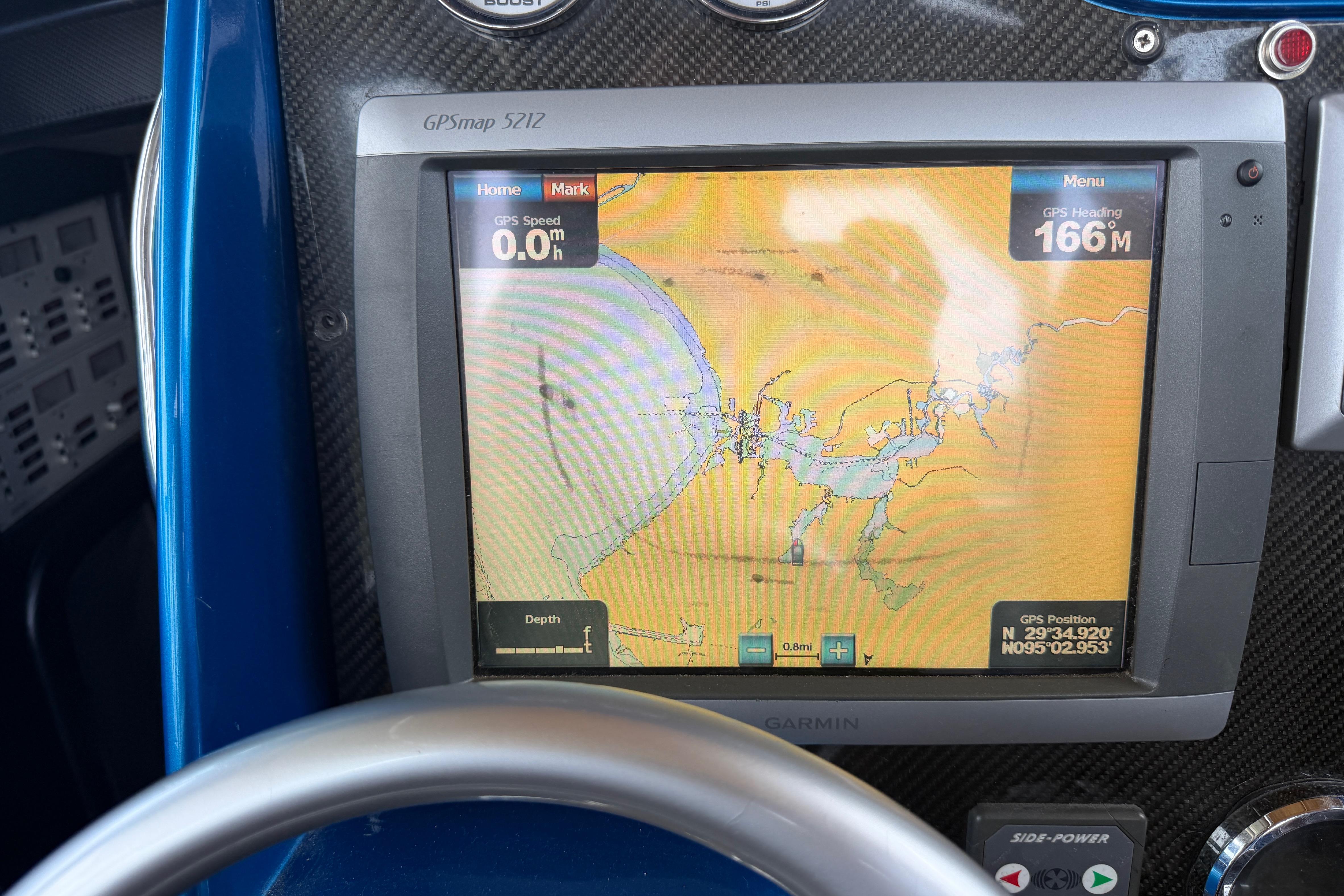 Garmin GPS display on 2013 Nor-Tech 477 SPX Vee Bottom boat dashboard.
