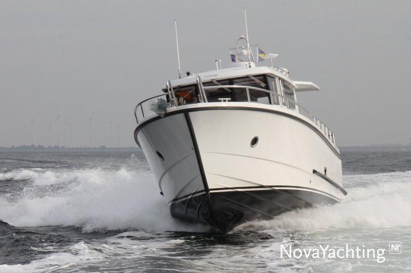 Sargo 36 motor yacht cruising on open water, 2017 model, Nova Yachting branding visible.