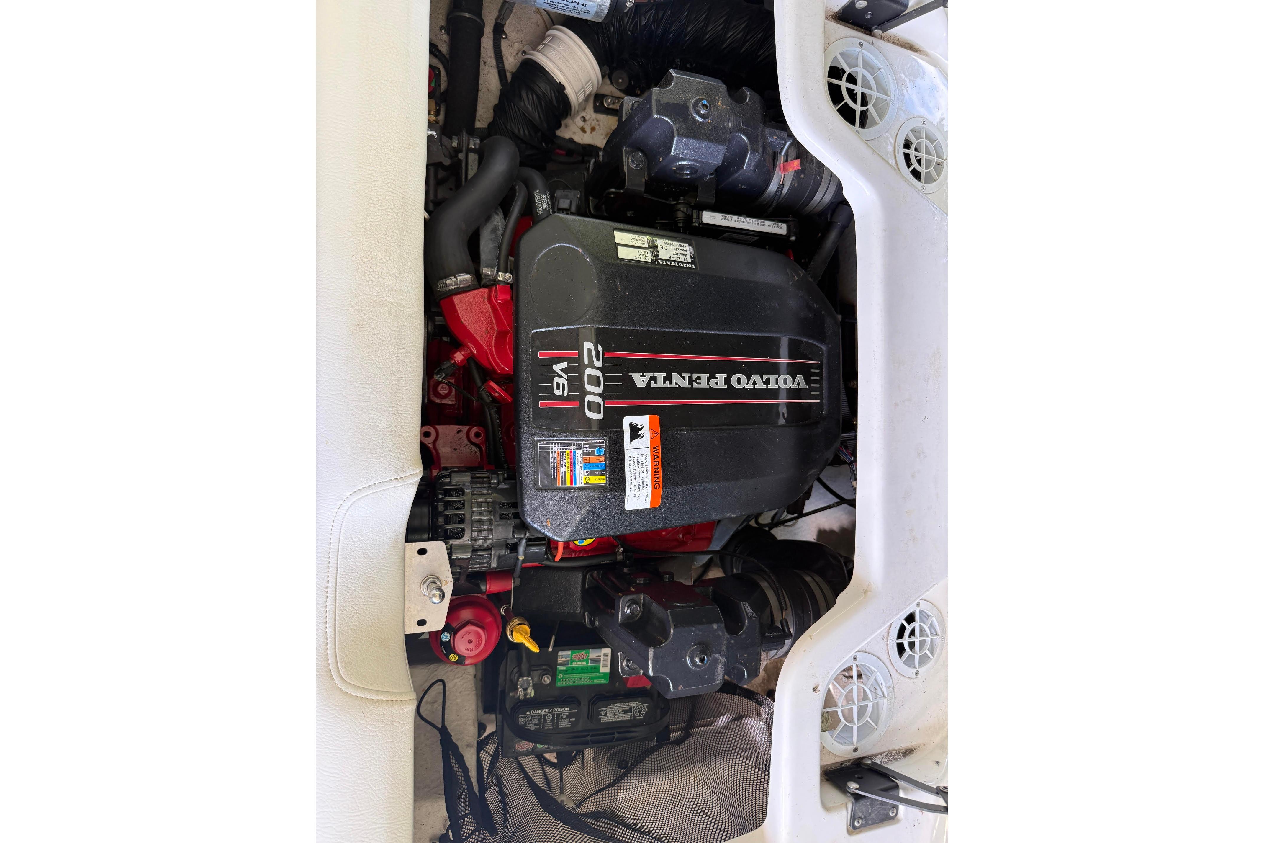 Engine compartment of a 2016 Regal 1900 ES Bowrider with Volvo Penta V6 200 engine.