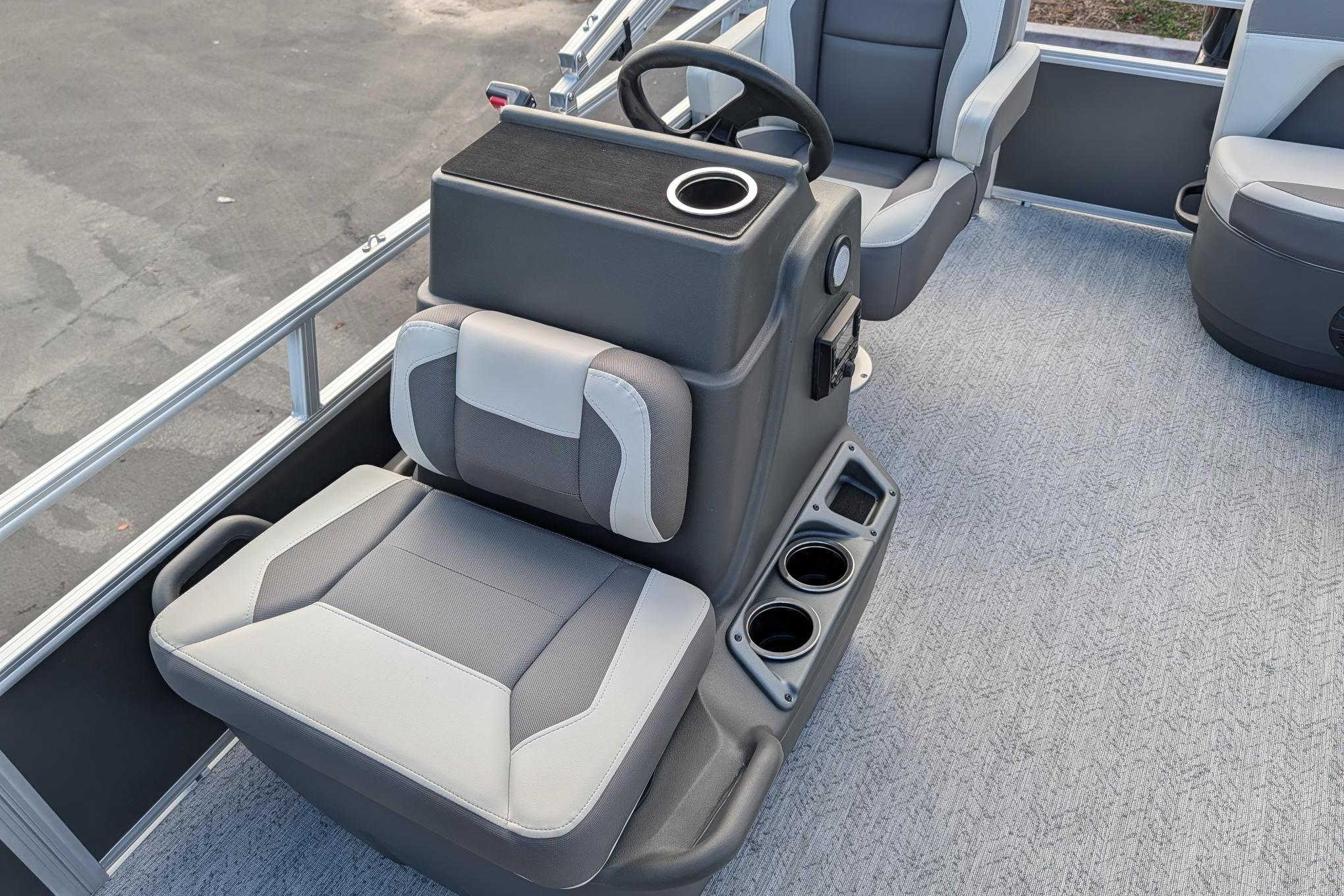 2026 Sun Tracker Bass Buggy 16 XL Select boat interior with steering console and seating.