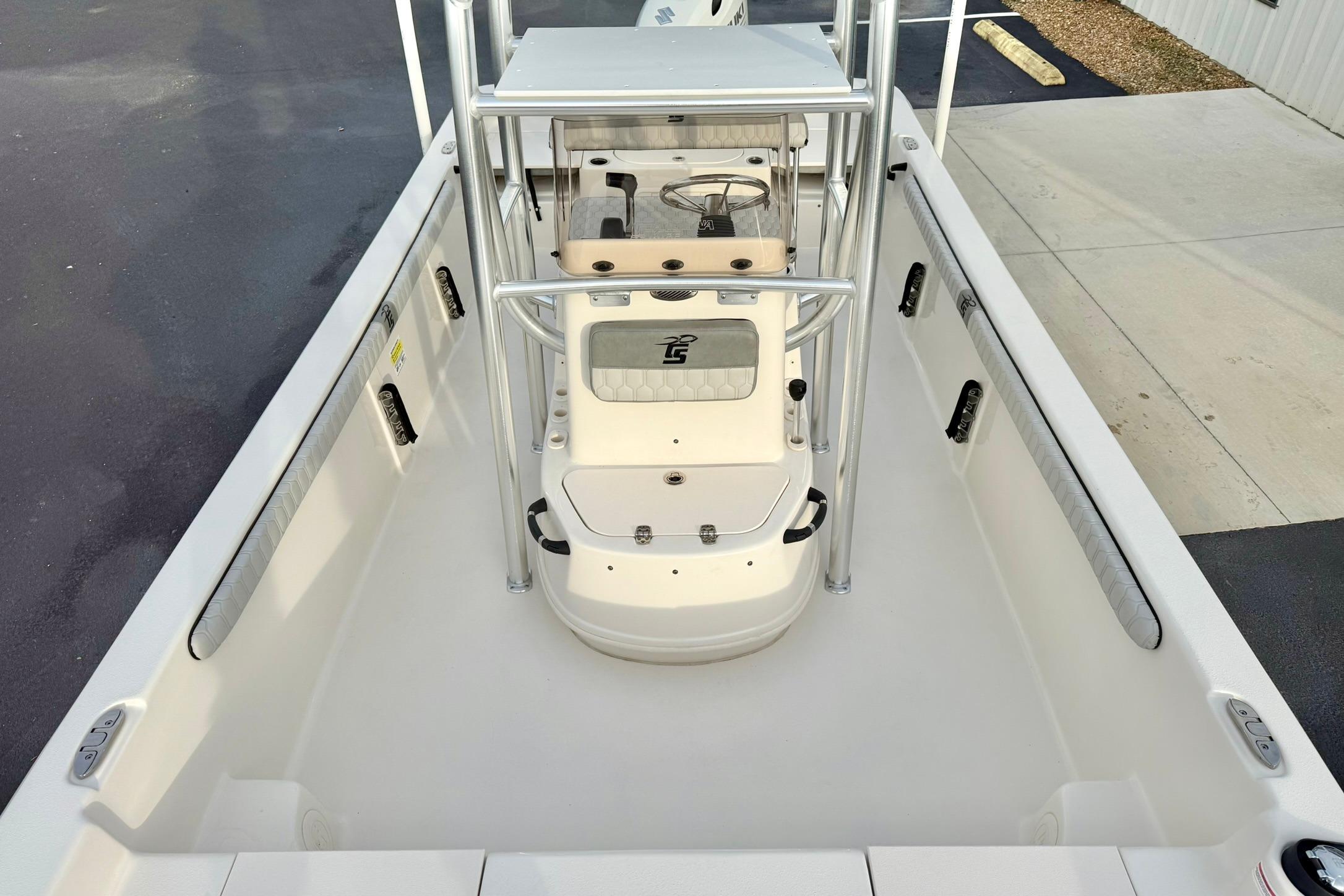 2025 Carolina Skiff 21 LS boat interior with steering console and seating.