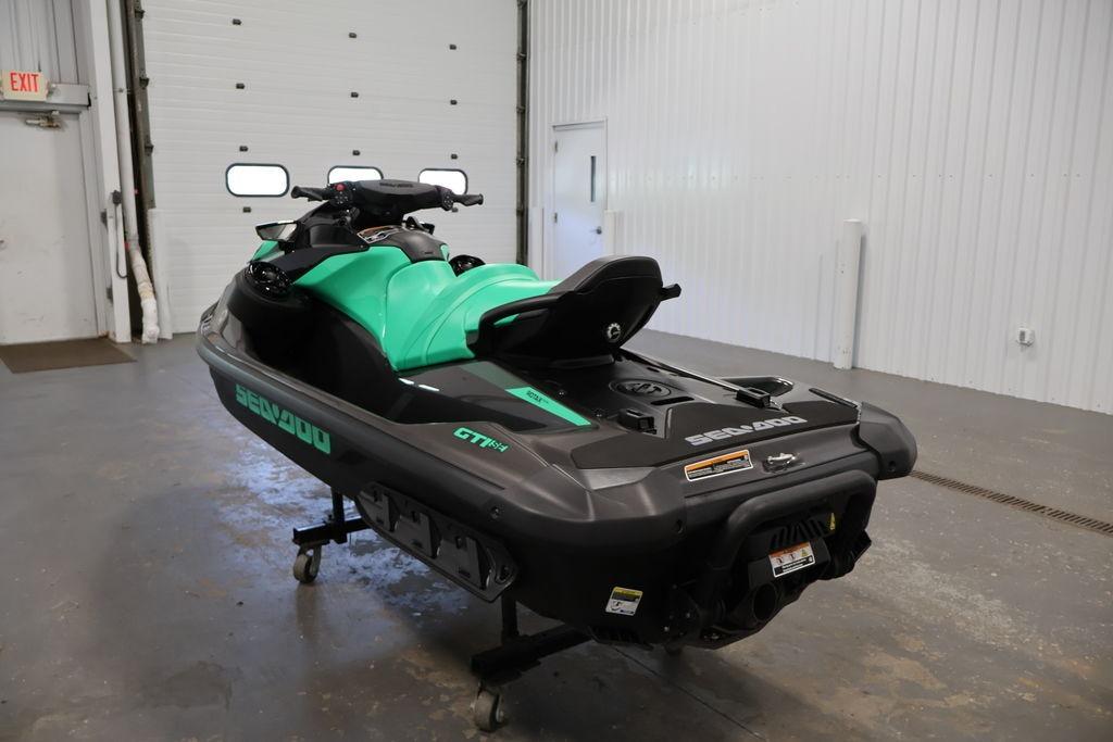 2026 Sea-Doo GTI SE 130 jet ski in a garage setting.