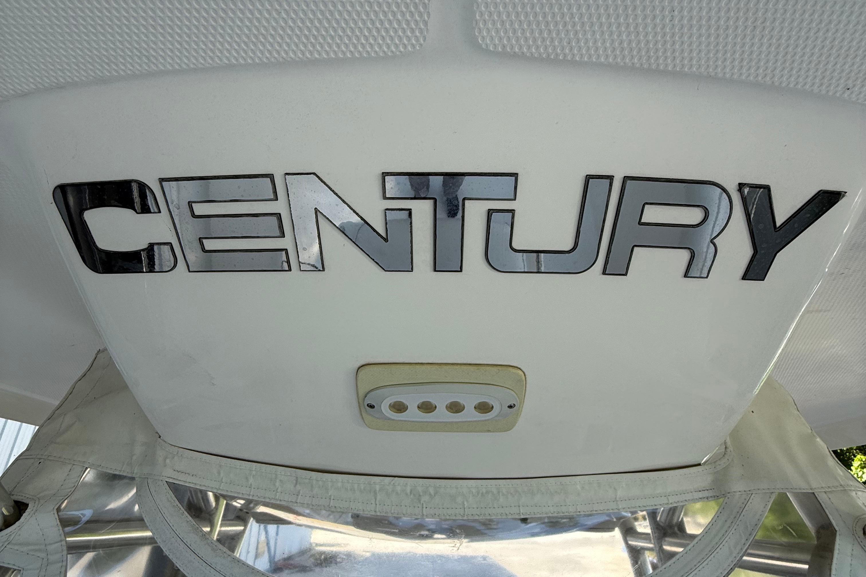 Century 2901 Center Console 2008 boat logo on white surface.